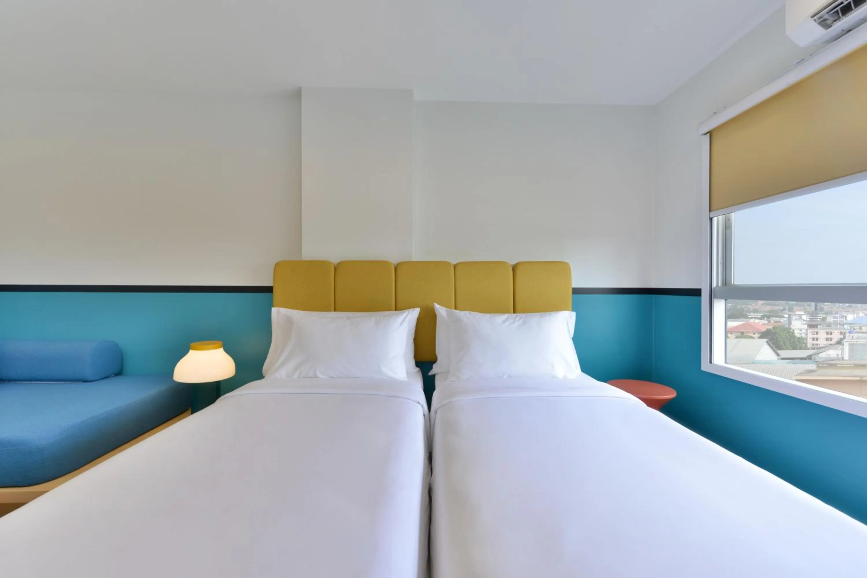 Bed in The Grass Serviced Suites