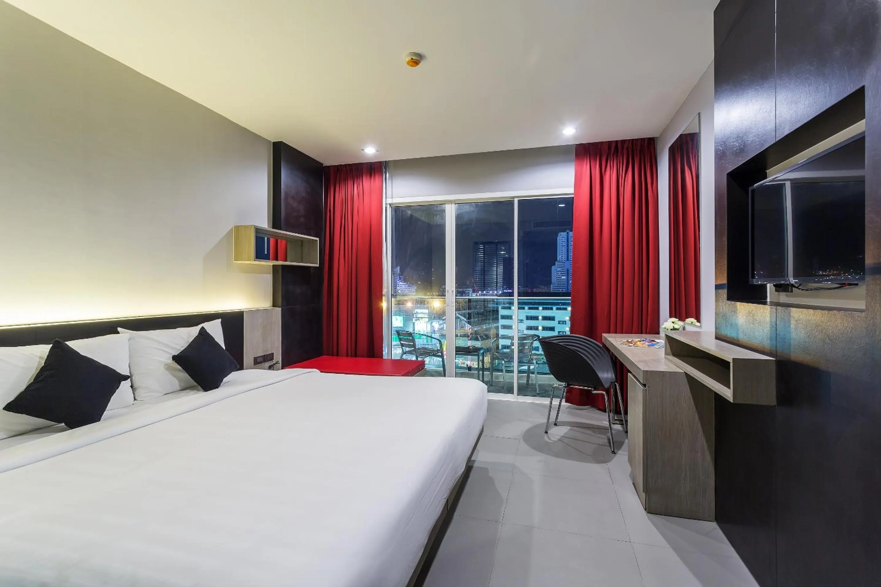 Communal lounge/ TV room, Bed in At Patong Hotel - SHA Certified