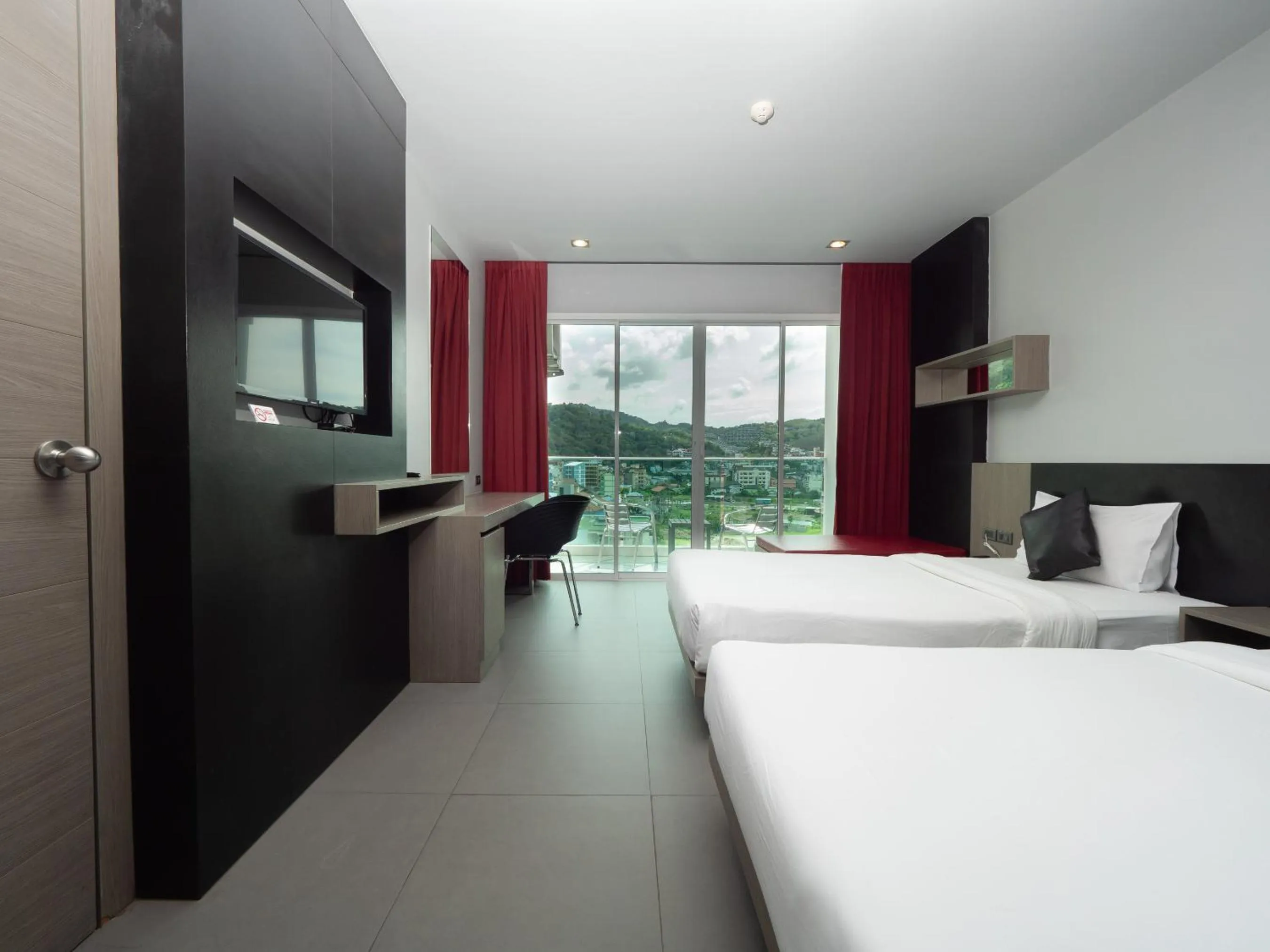 Photo of the whole room, Bed in At Patong Hotel - SHA Certified