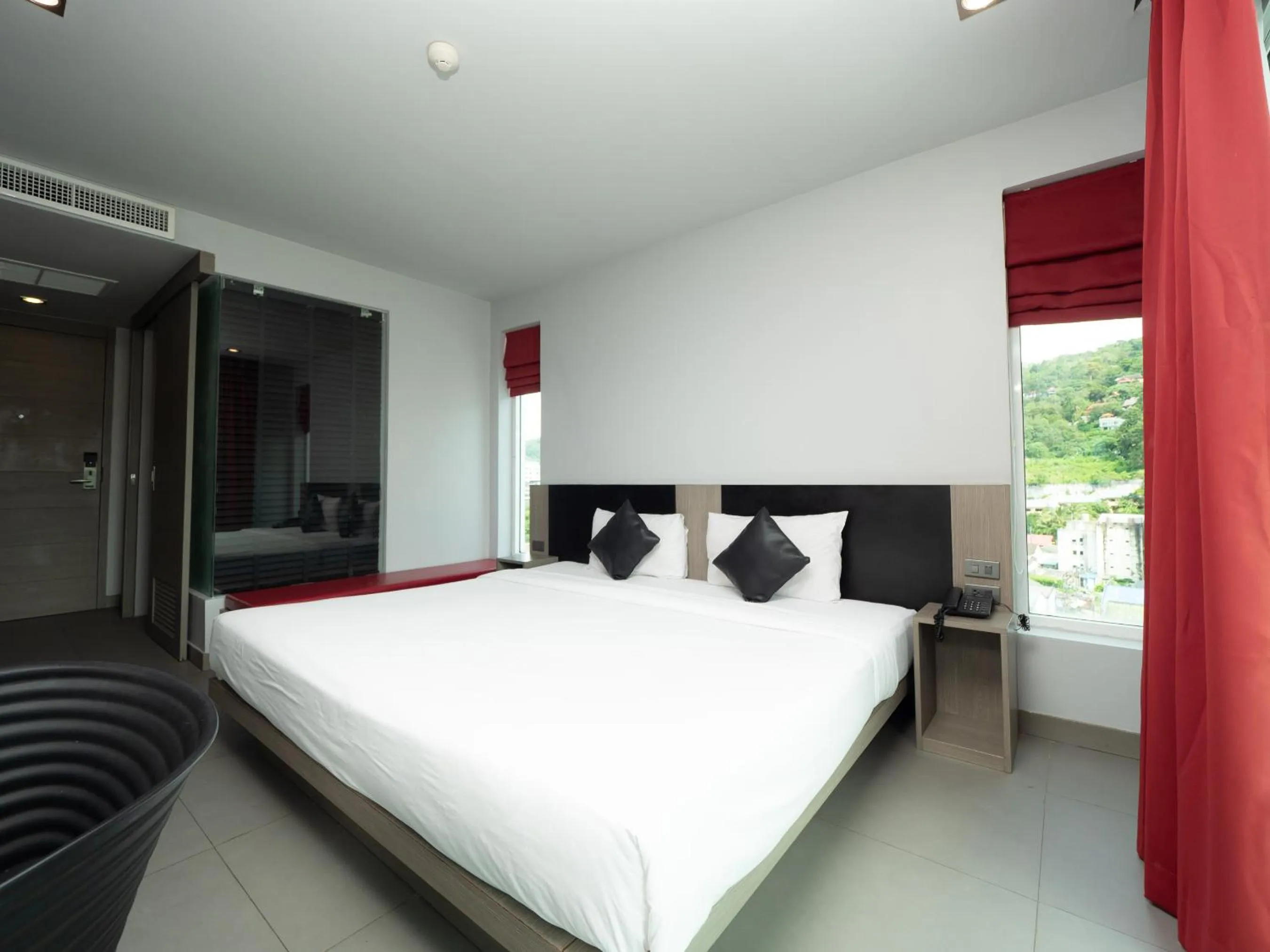 Photo of the whole room, Bed in At Patong Hotel - SHA Certified