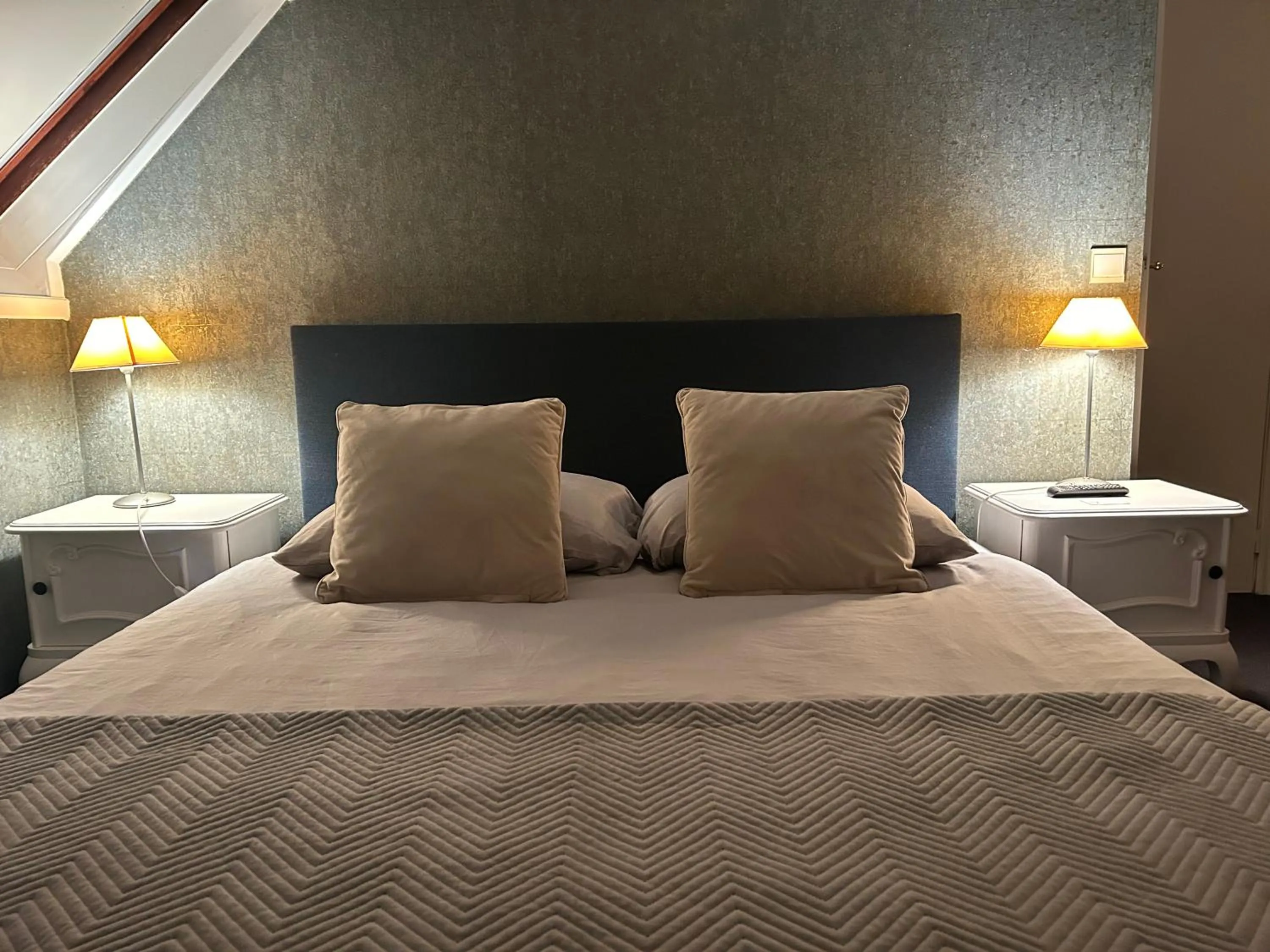 Bed in Hotel Vredehof