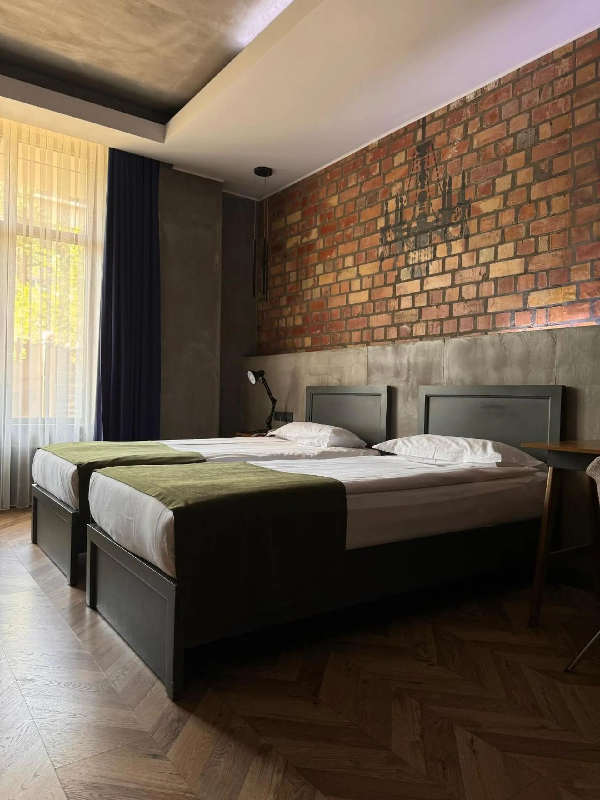 Bed in Bugu Hotel Bishkek