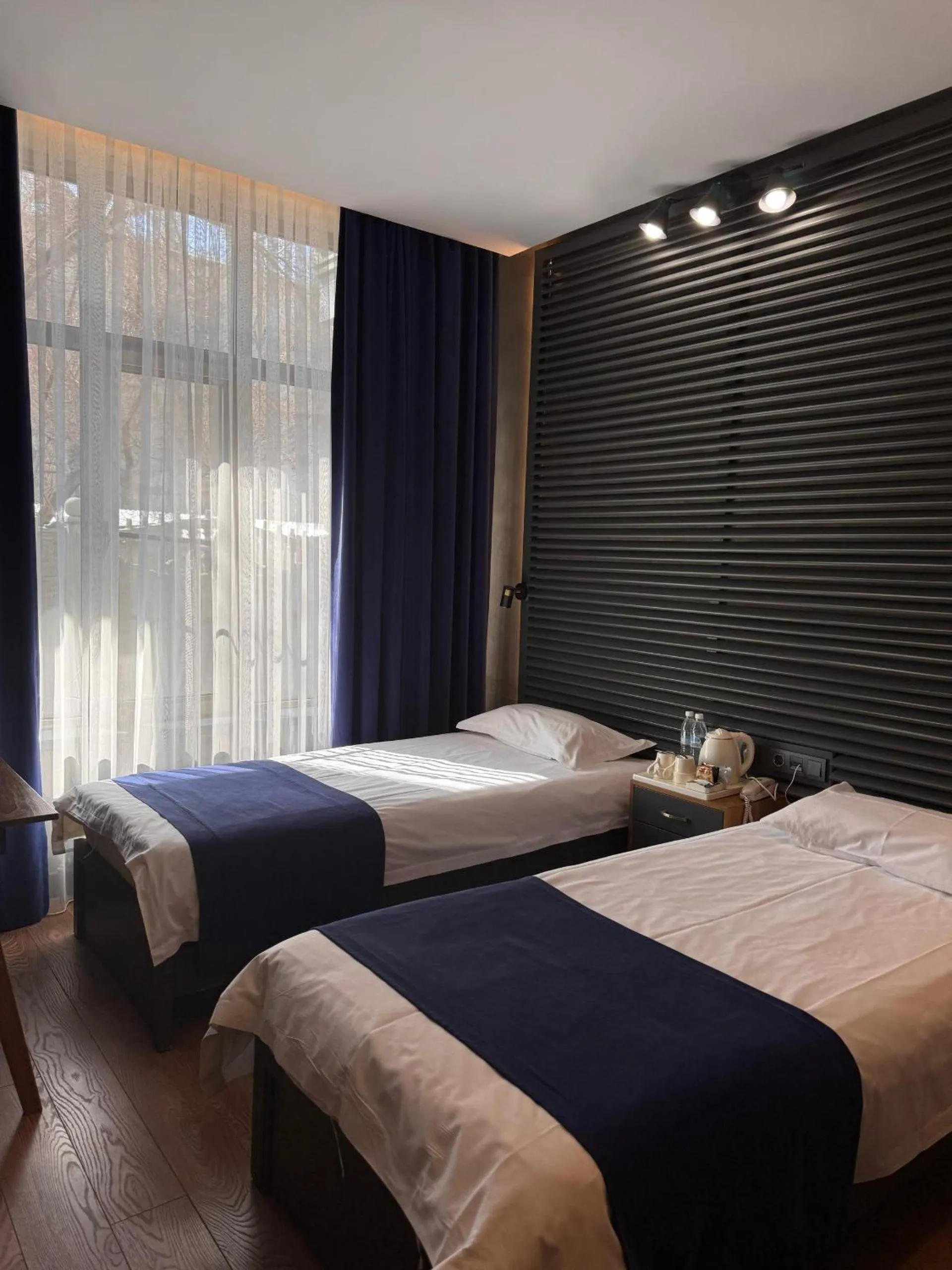 Bed in Bugu Hotel Bishkek