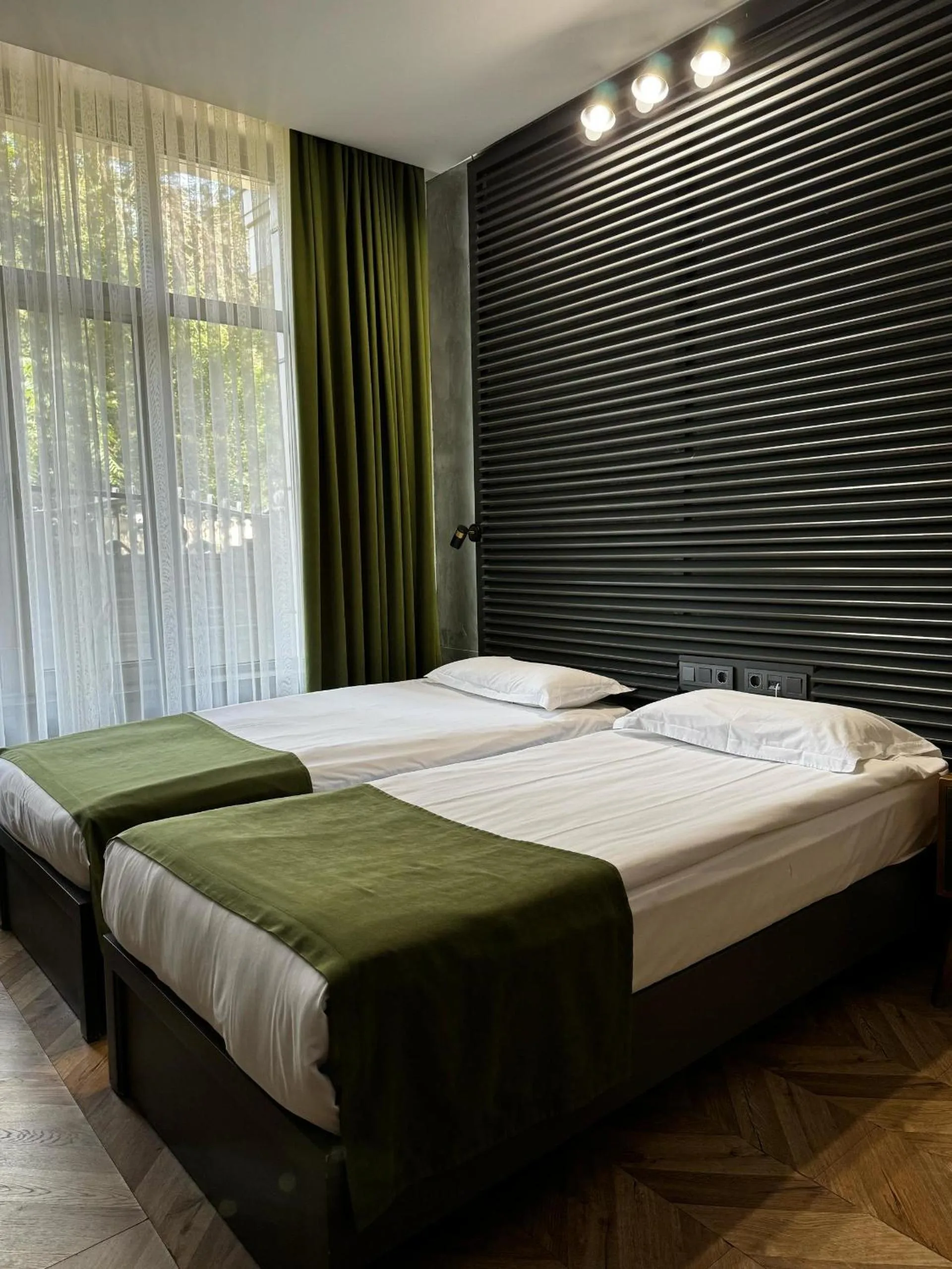 Bed in Bugu Hotel Bishkek