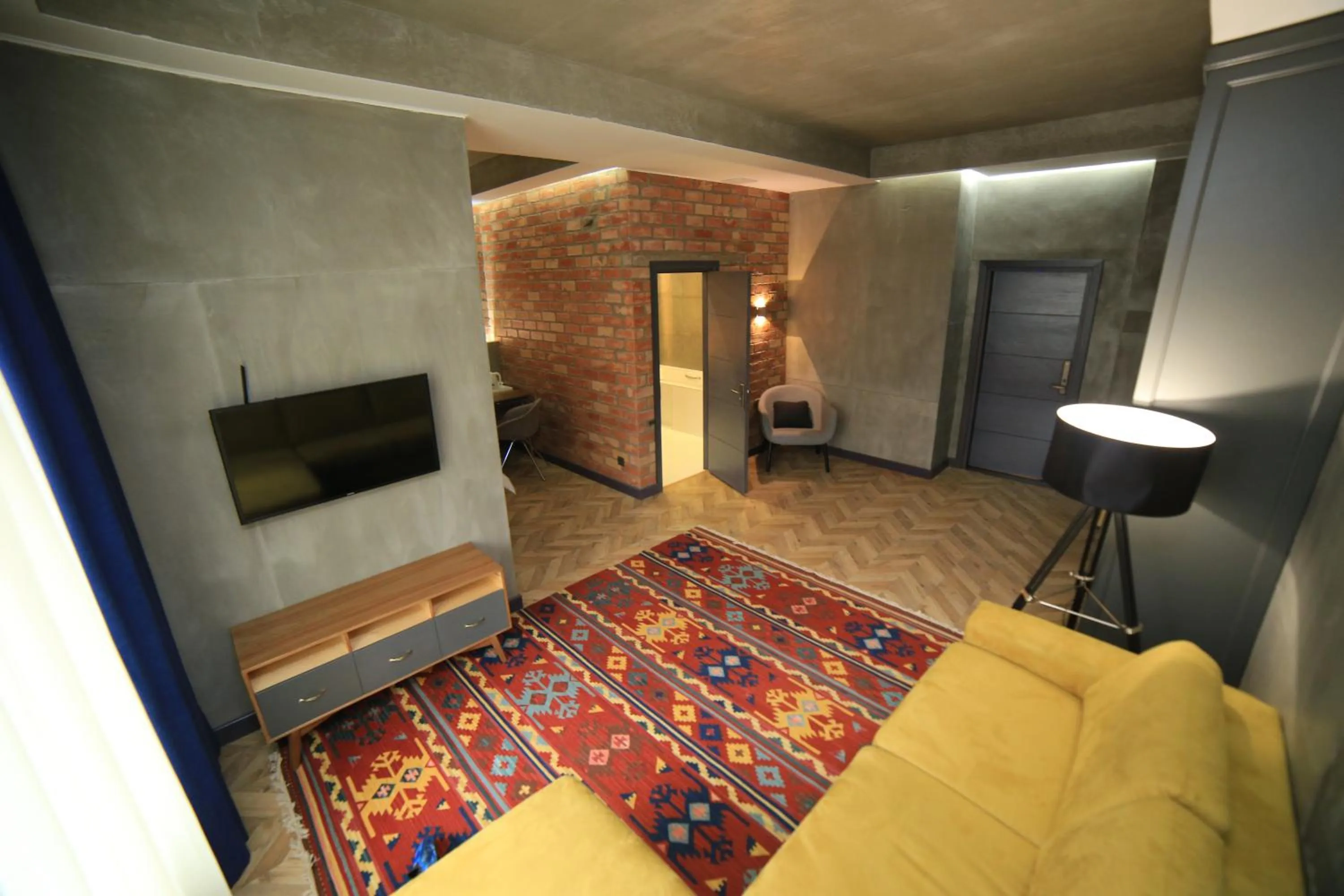 Photo of the whole room in Bugu Hotel Bishkek