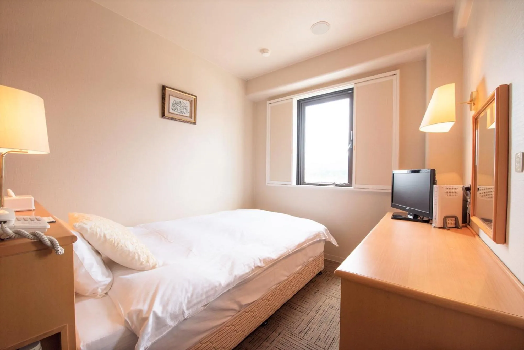 Photo of the whole room, Bed in Central Hotel Imari