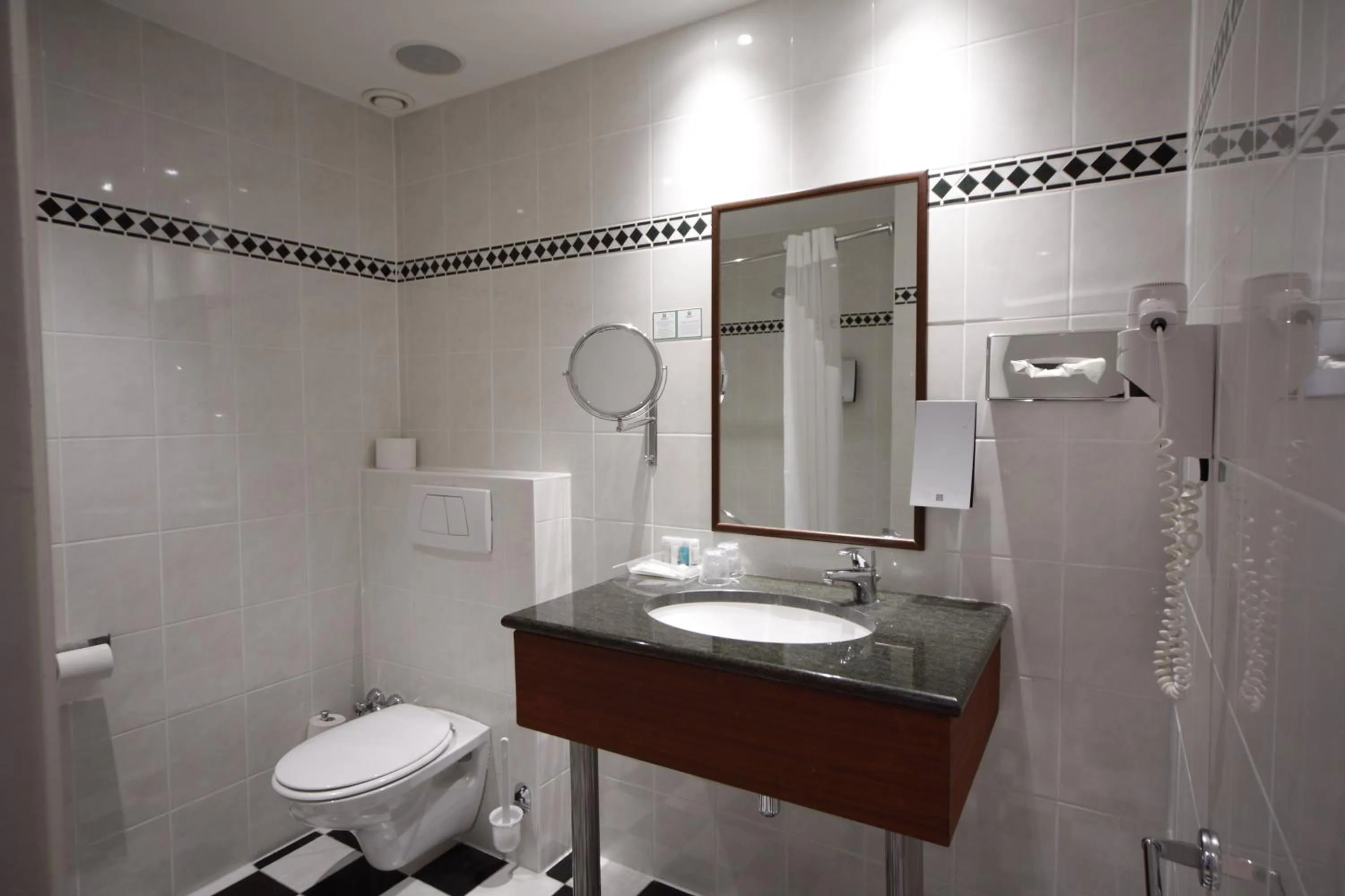 Bathroom in Holiday Inn Brussels Schuman by IHG