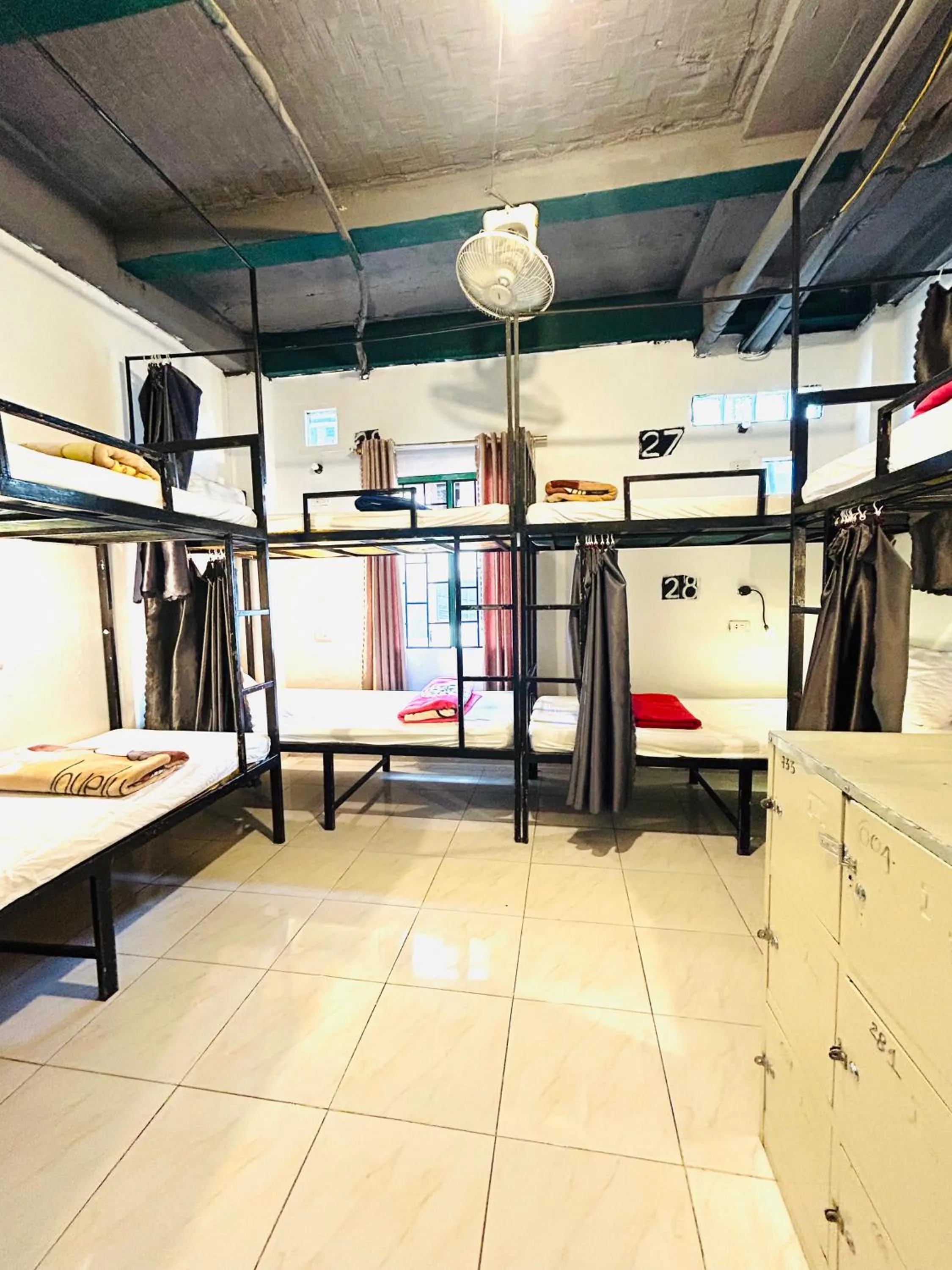 Bed in Vangvieng Rock Backpacker Rooftop Hostel