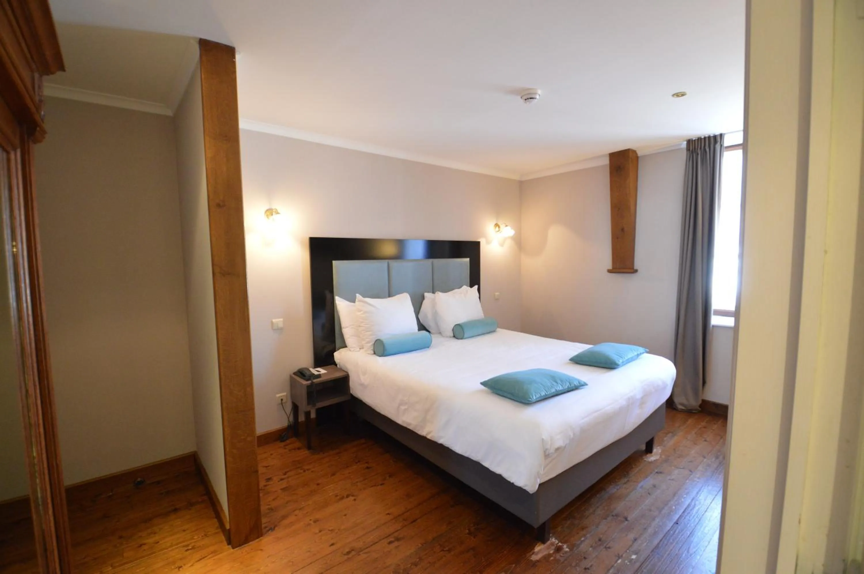 Bed in Hotel de la Poste - Relais de Napoleon III