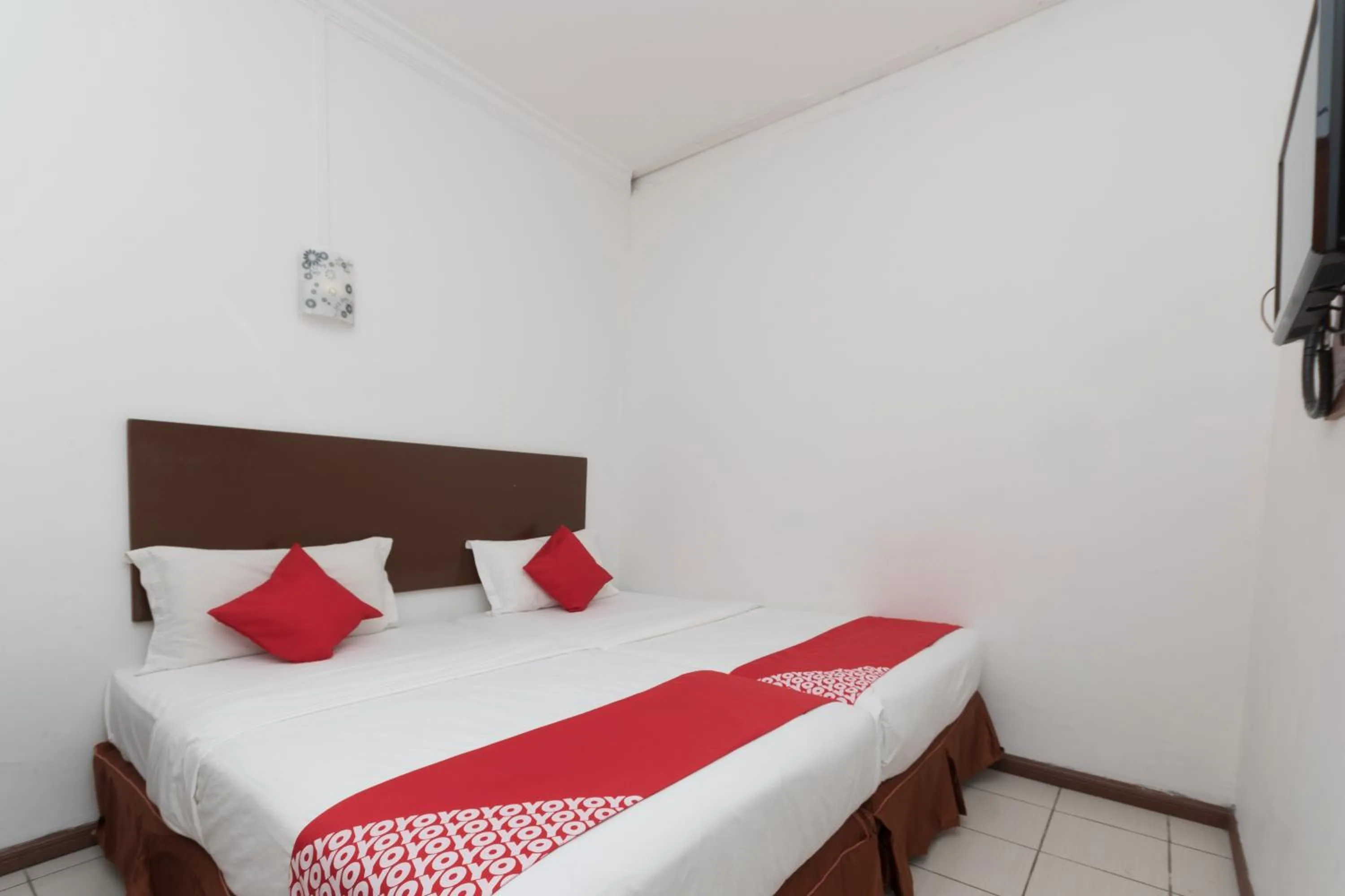 Bedroom, Bed in OYO 218 Storytel