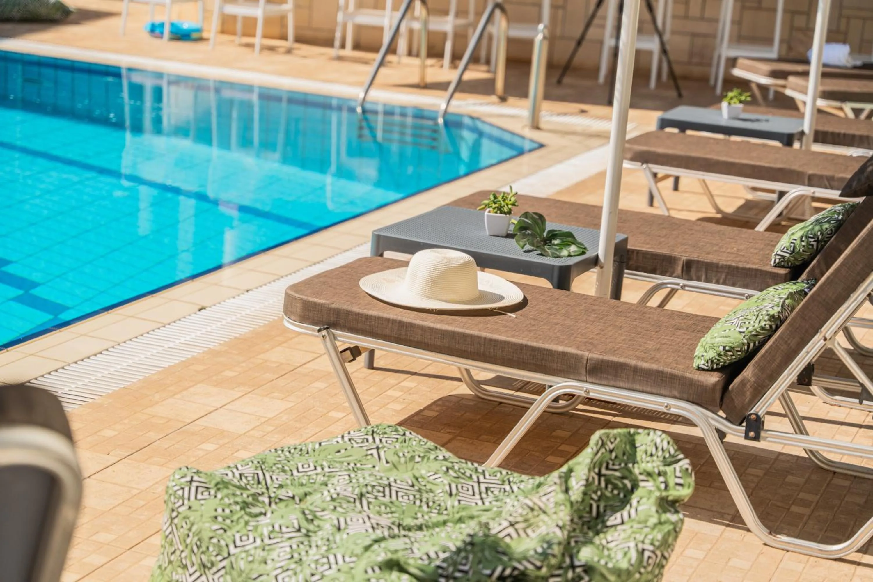 Swimming pool in Sunshine Boutique Hotel by Estia
