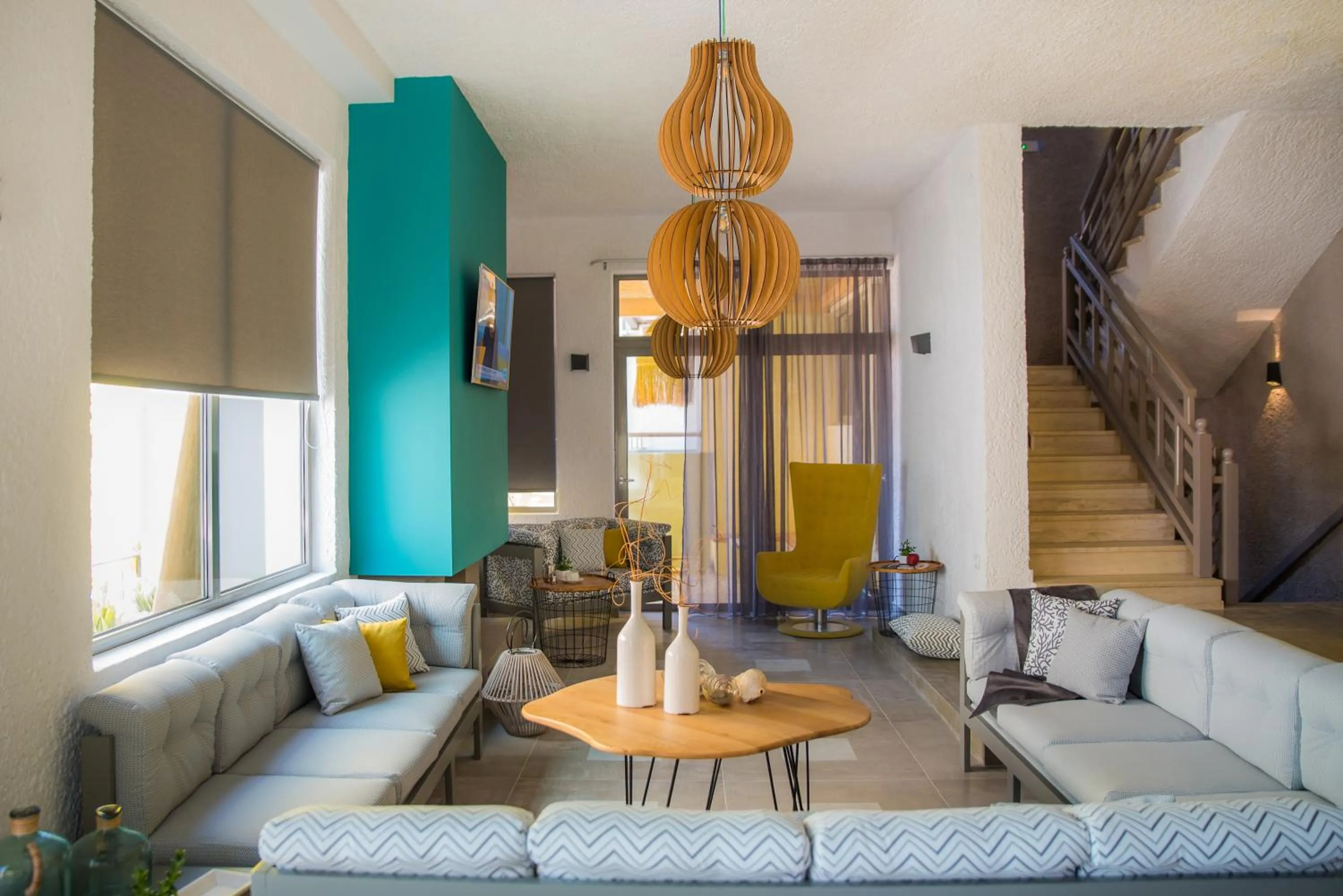 Communal lounge/ TV room in Sunshine Boutique Hotel by Estia