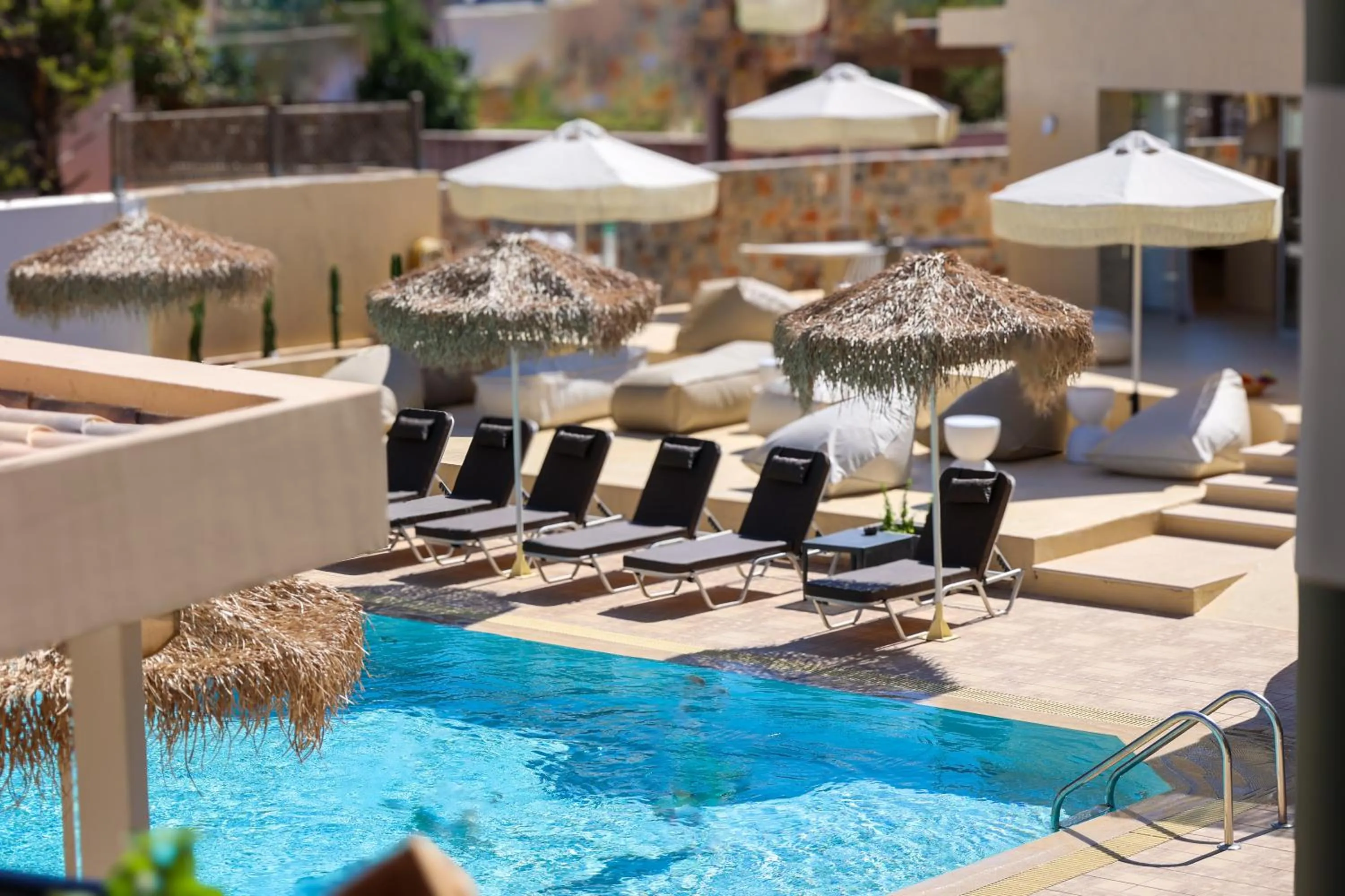 Swimming pool in Sunshine Boutique Hotel by Estia