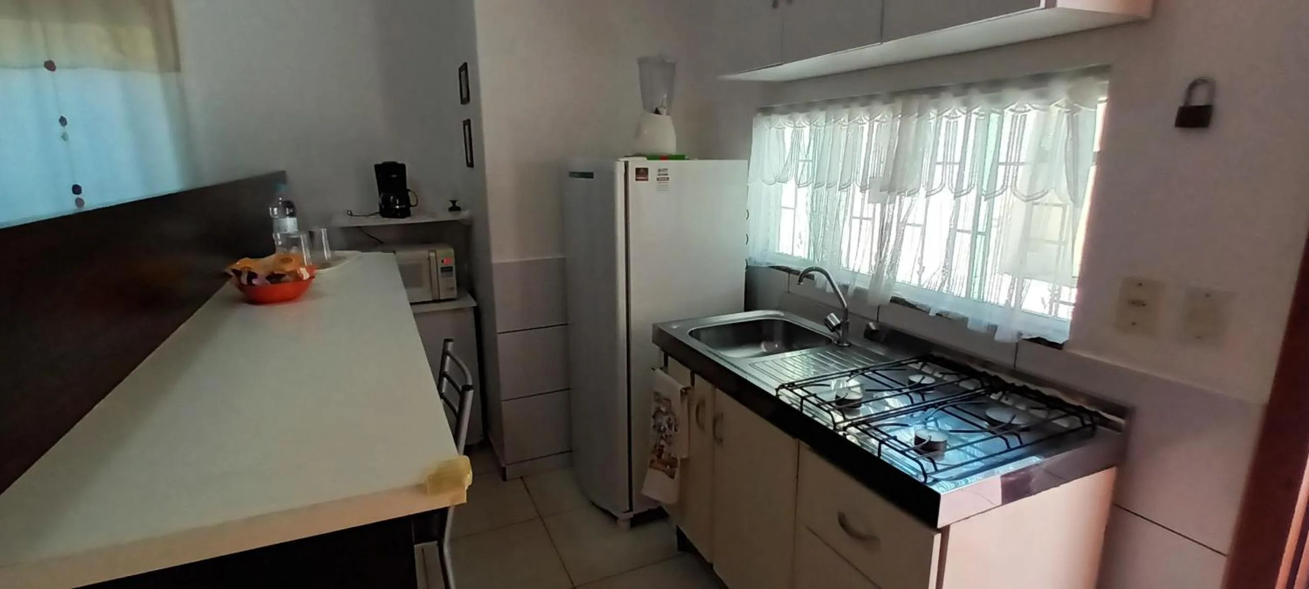 Kitchen or kitchenette in Studio Morro das Pedras