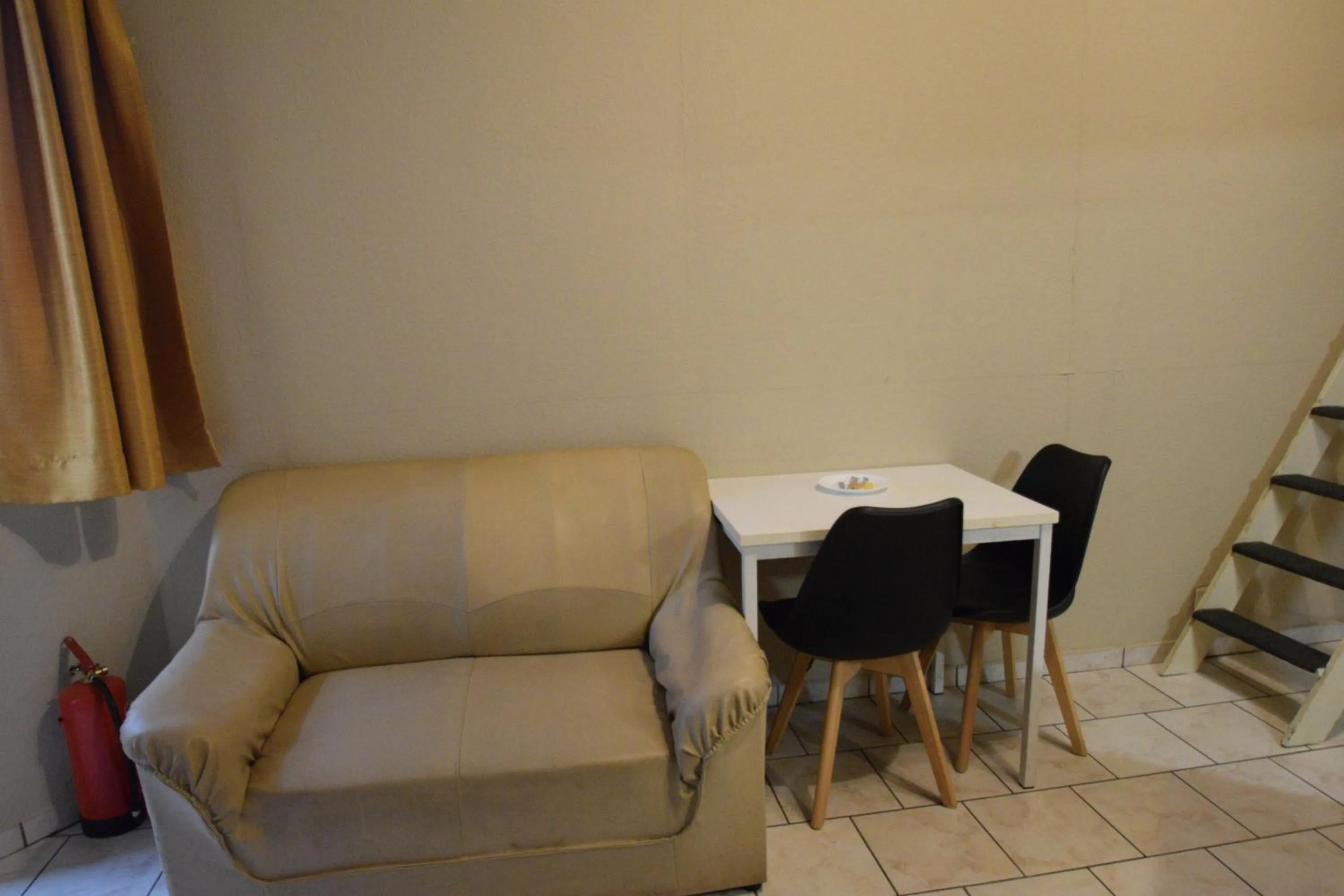 Seating area in Condo Gardens Leuven