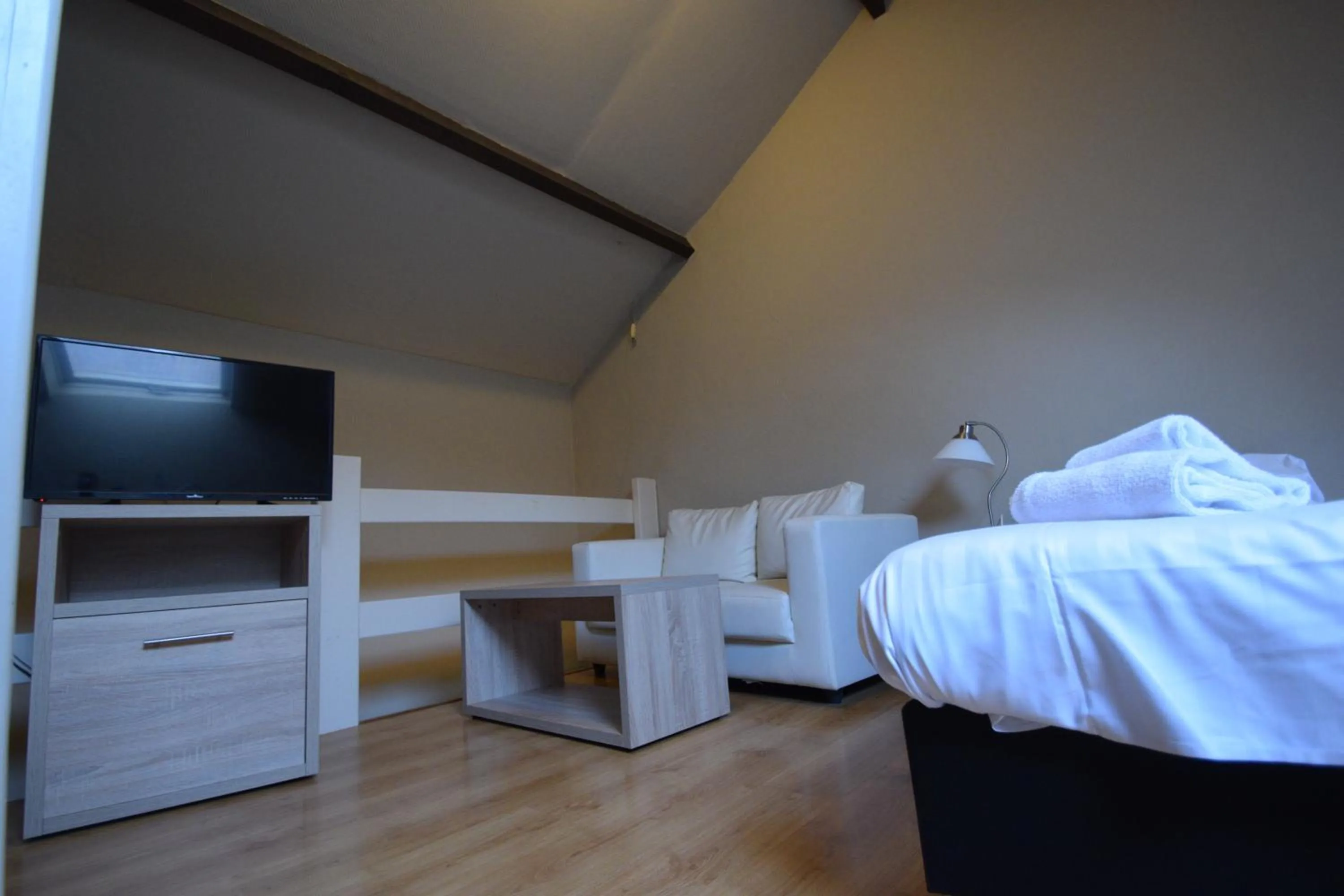 Bed in Condo Gardens Leuven