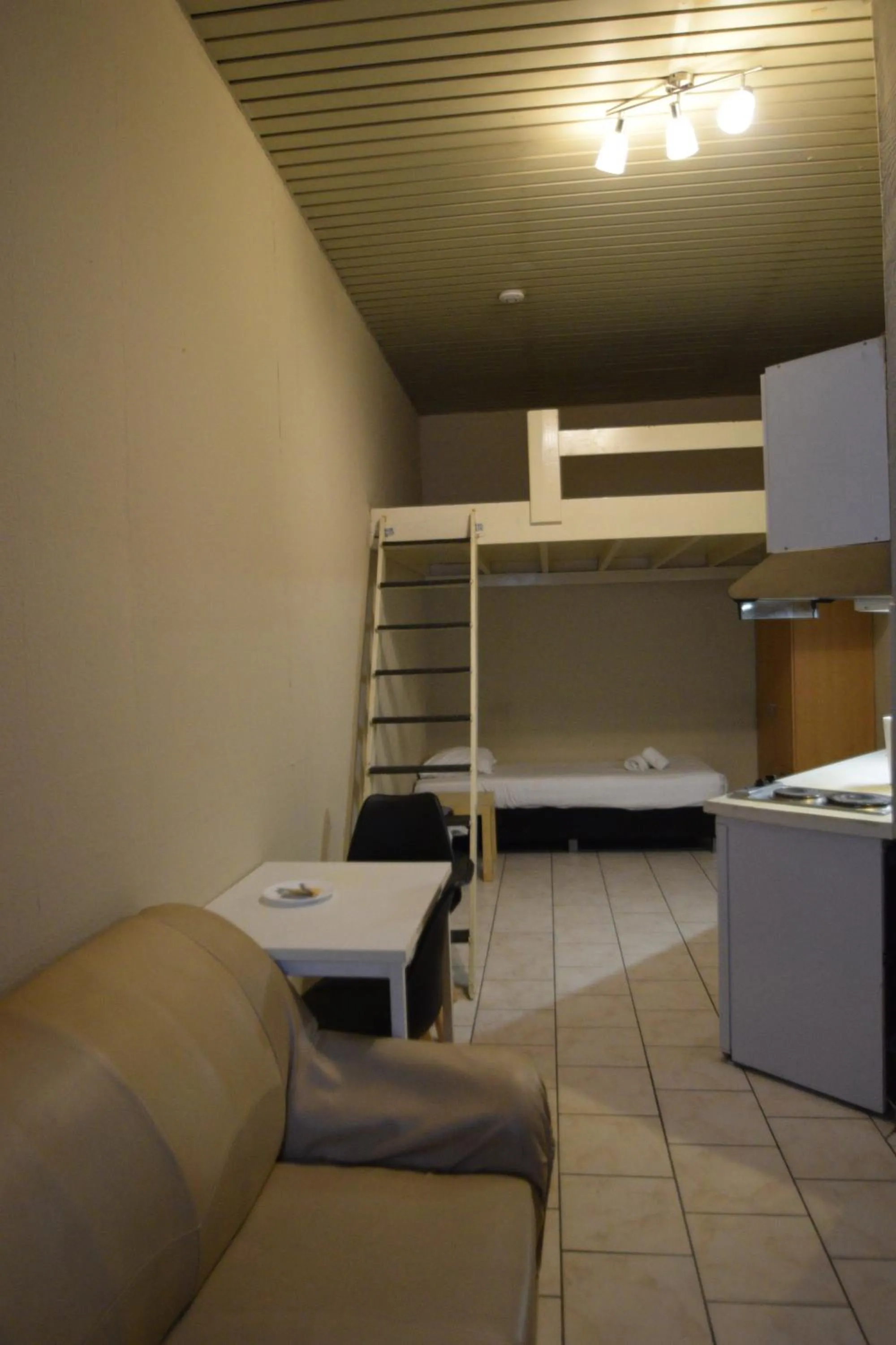 Bed in Condo Gardens Leuven