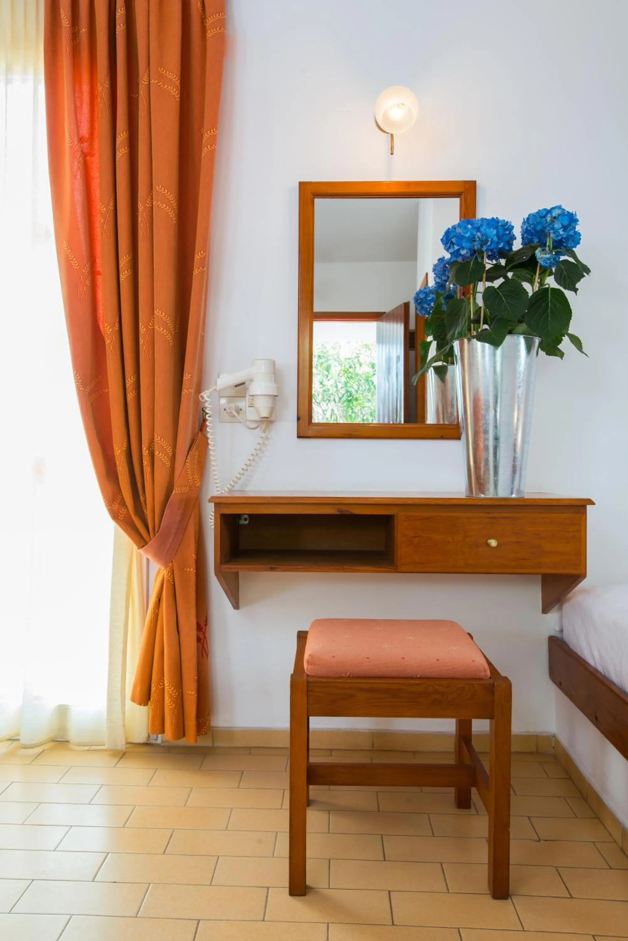 Bedroom in Delfinia Hotel & Bungalows