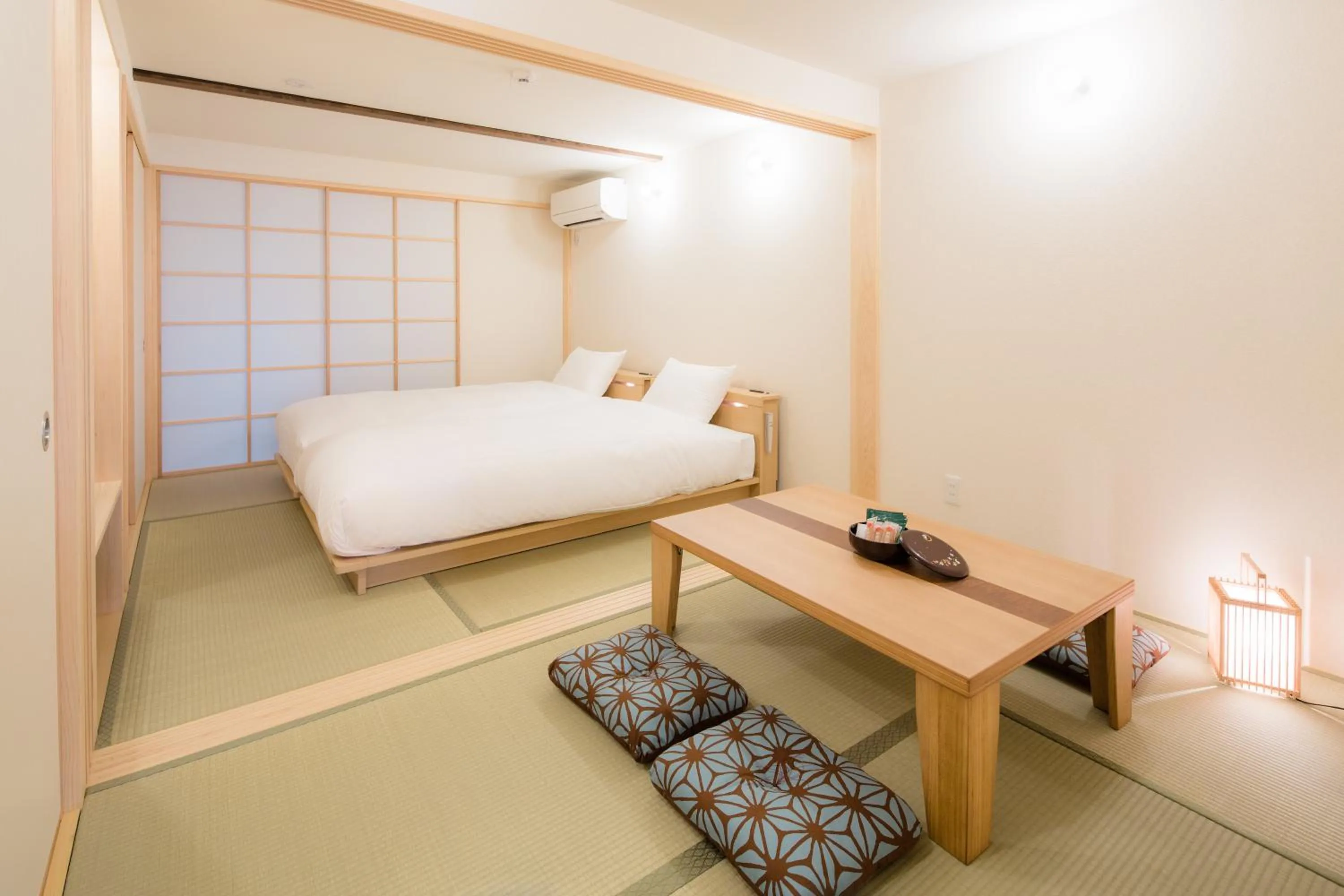 Bed in RESI STAY Anekoji
