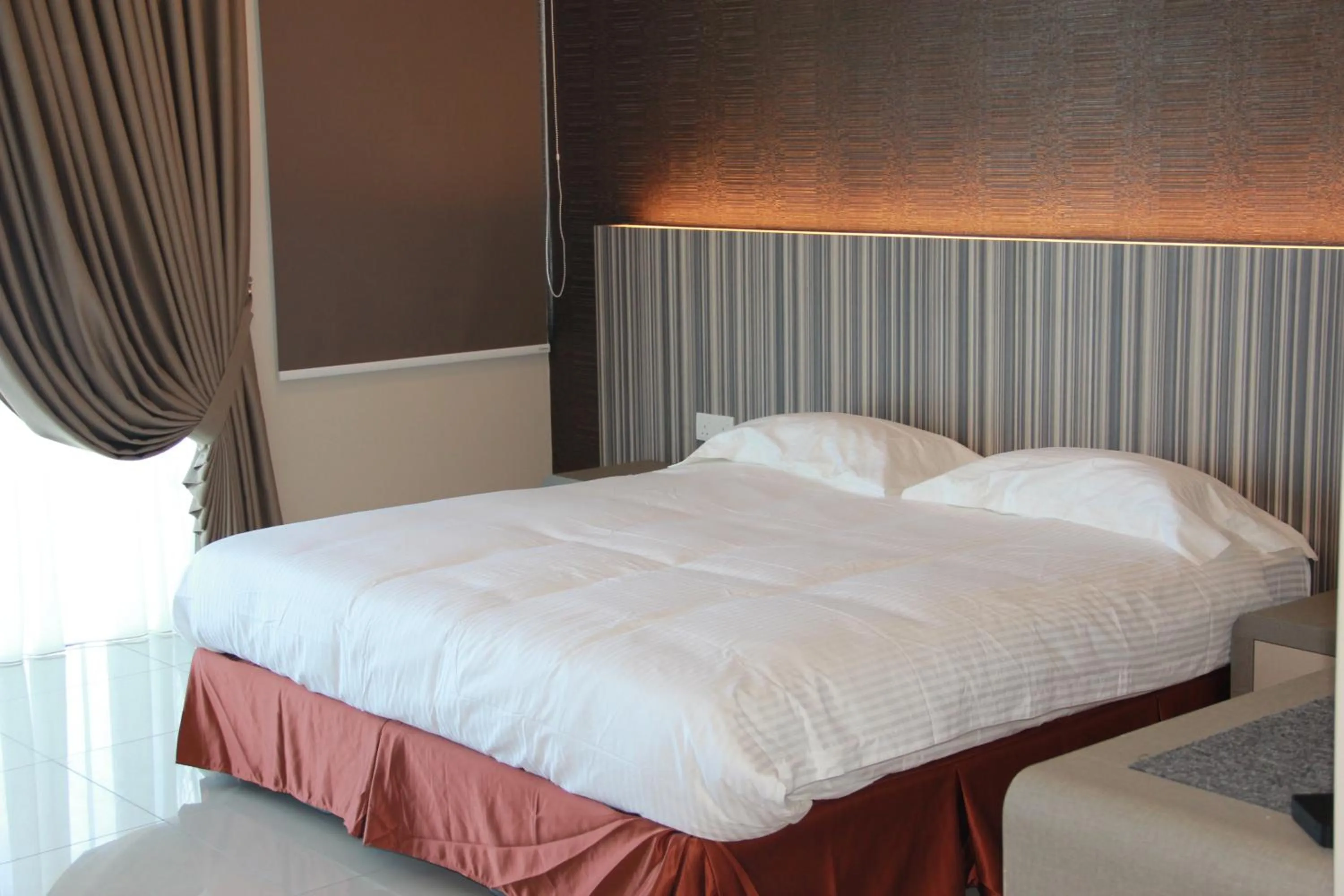 Bed in Setia Inn Suites Service Residence