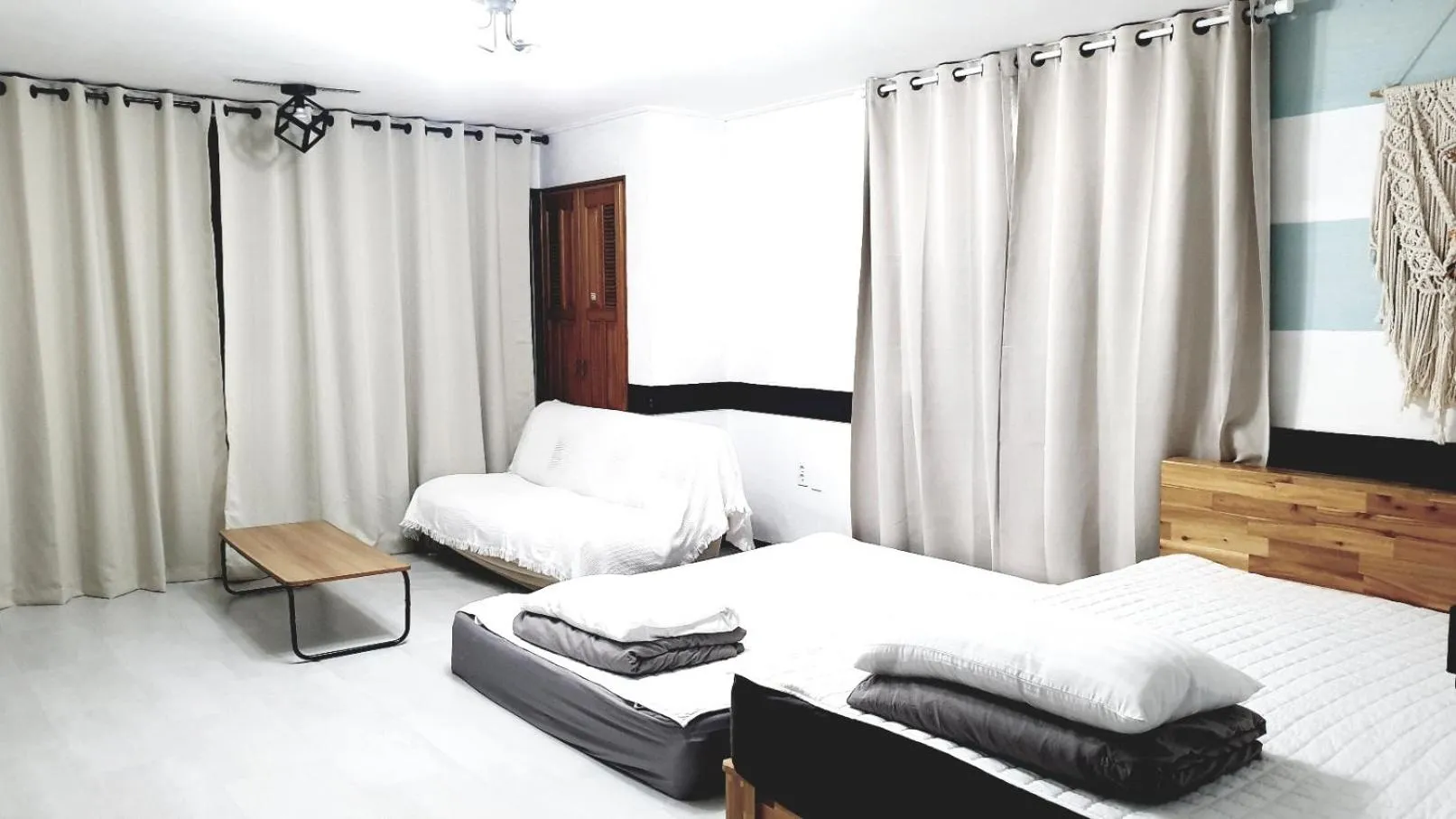 Bed in Morning Beach Pension