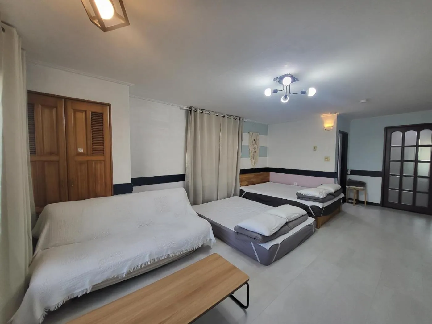 Bed in Morning Beach Pension