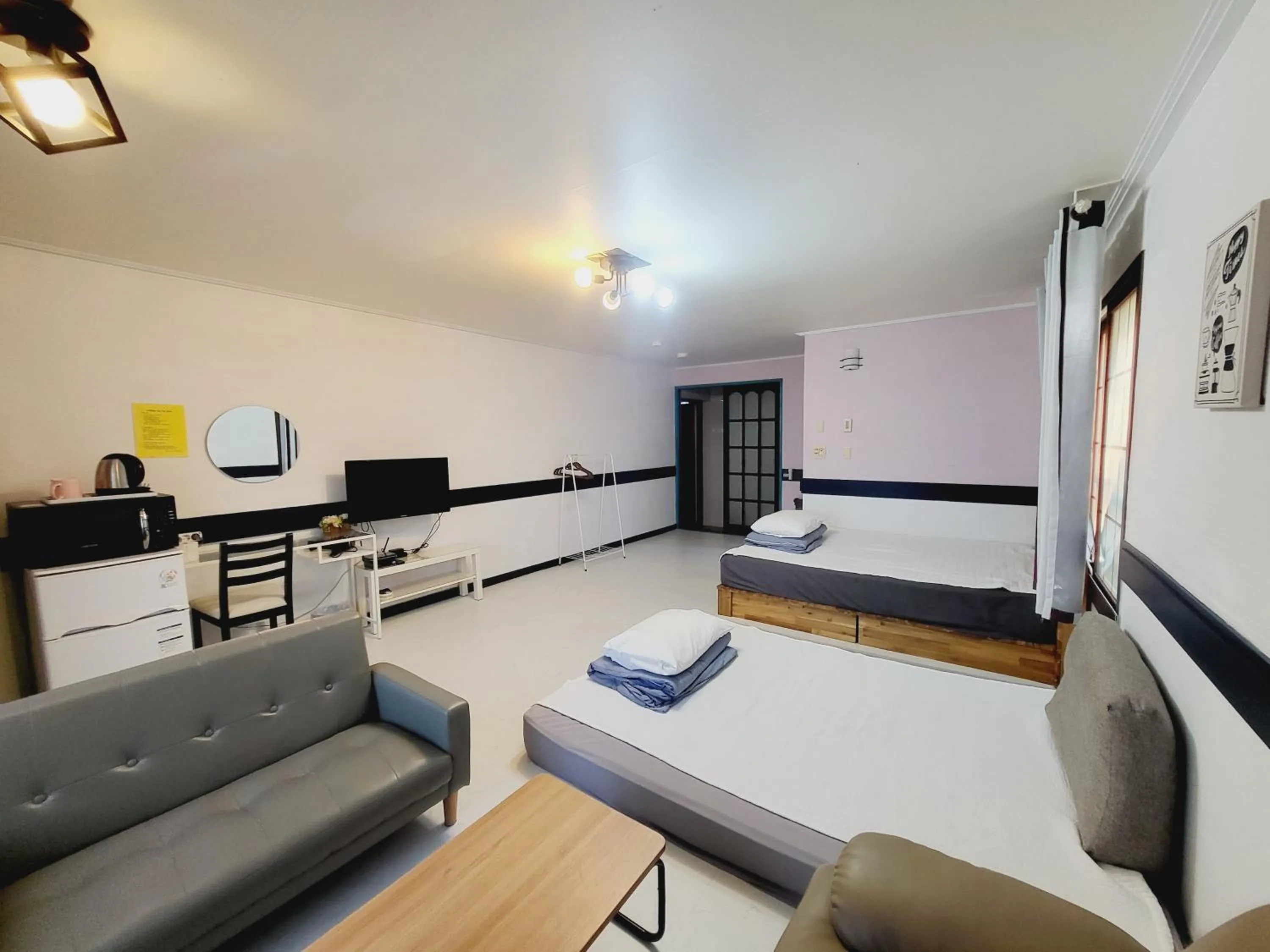 Bed in Morning Beach Pension