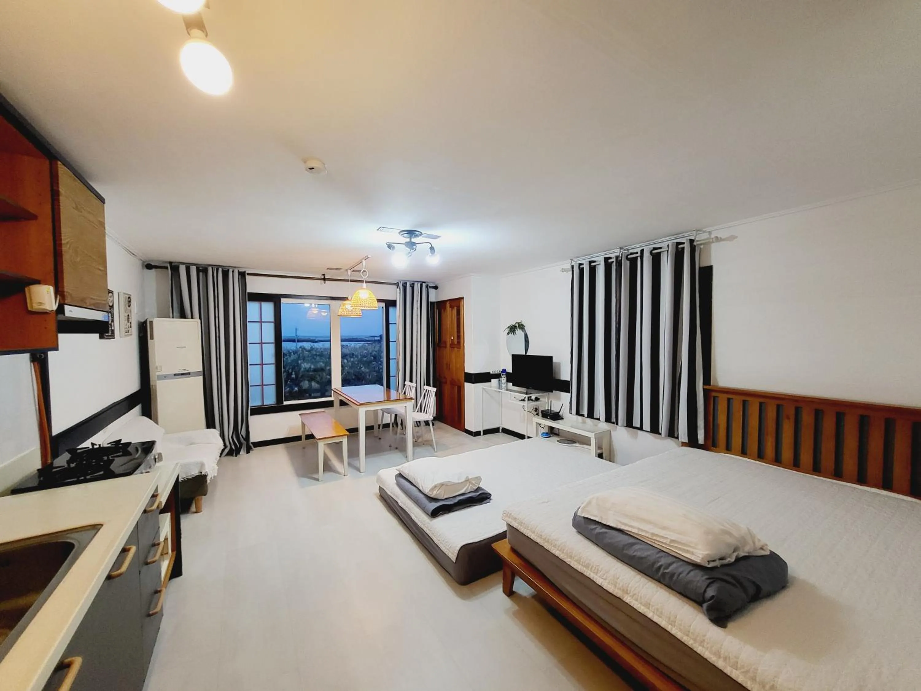 Bed in Morning Beach Pension