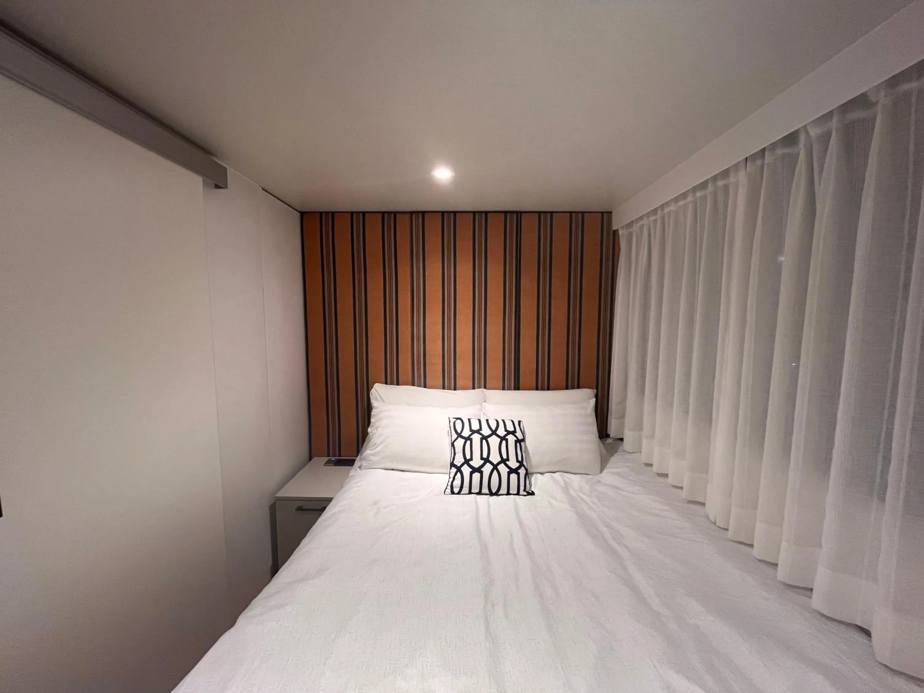 Bed in Morning Beach Pension