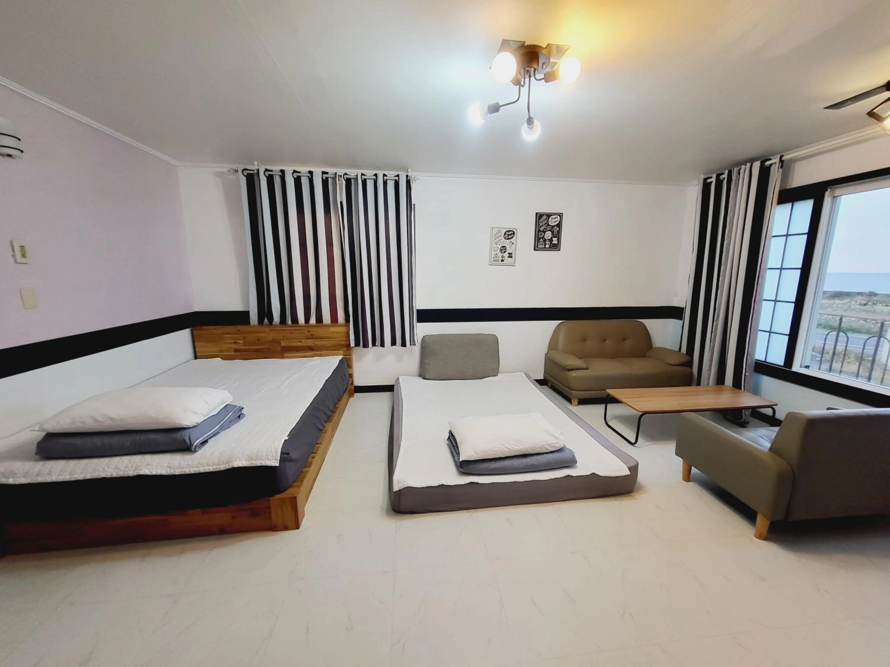 Bed in Morning Beach Pension