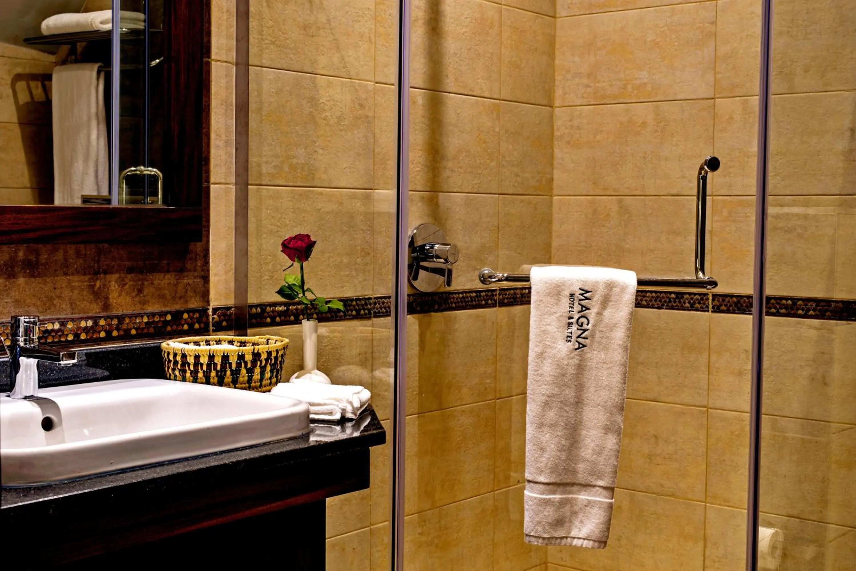 Bathroom in Magna Hotel and Suites