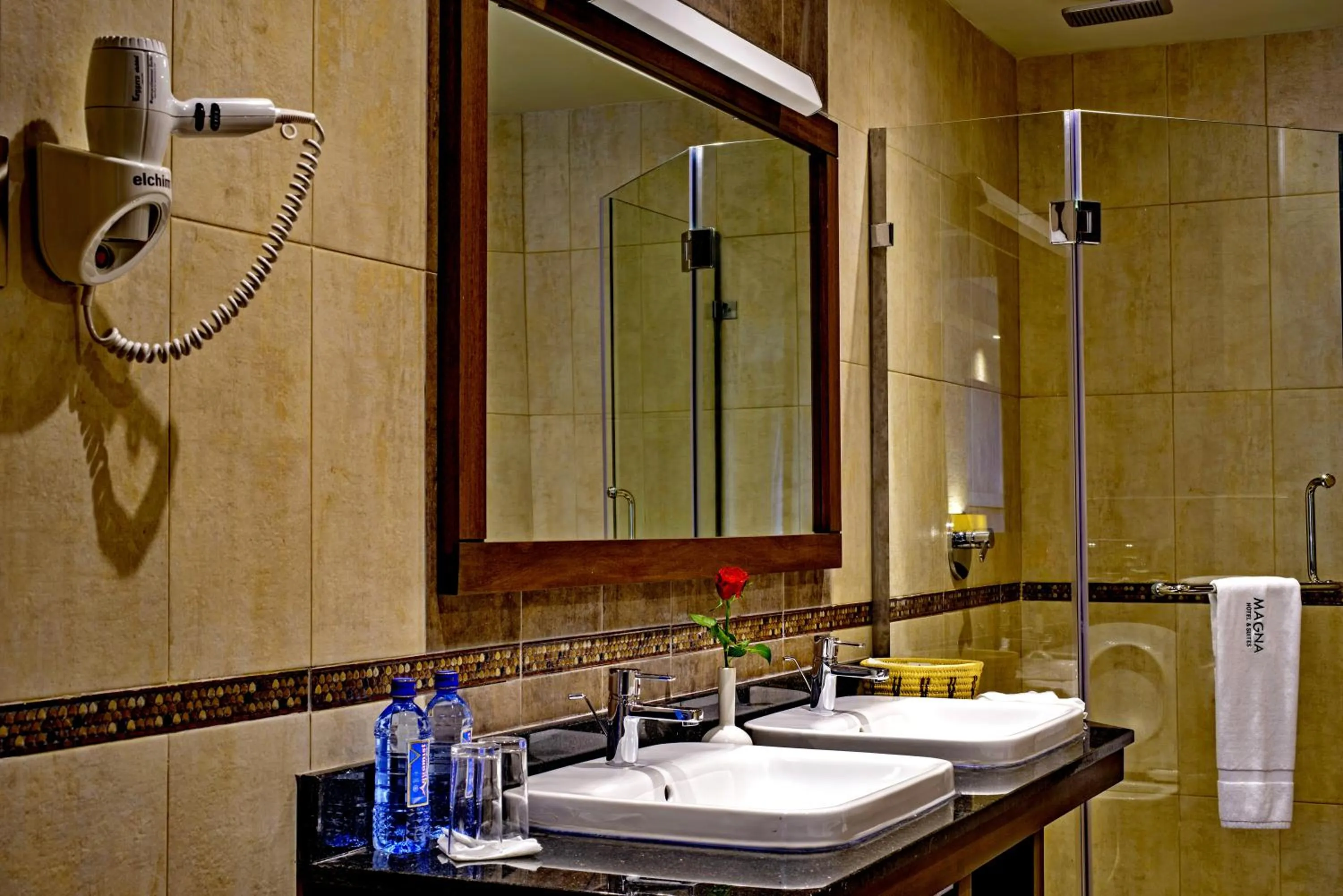 Bathroom in Magna Hotel and Suites