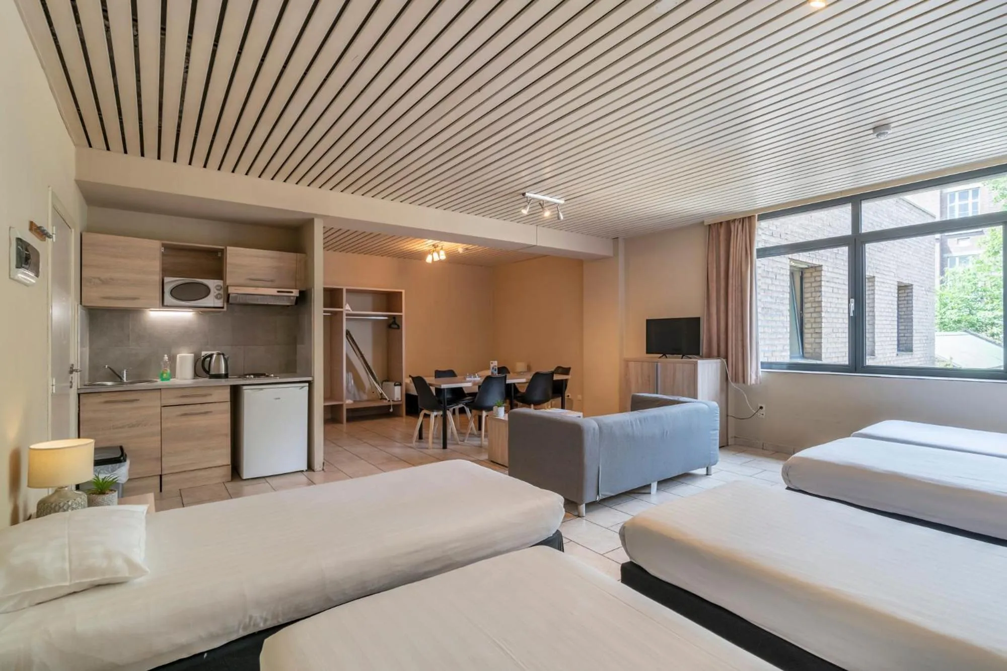 Bed in Condo Gardens Brussels