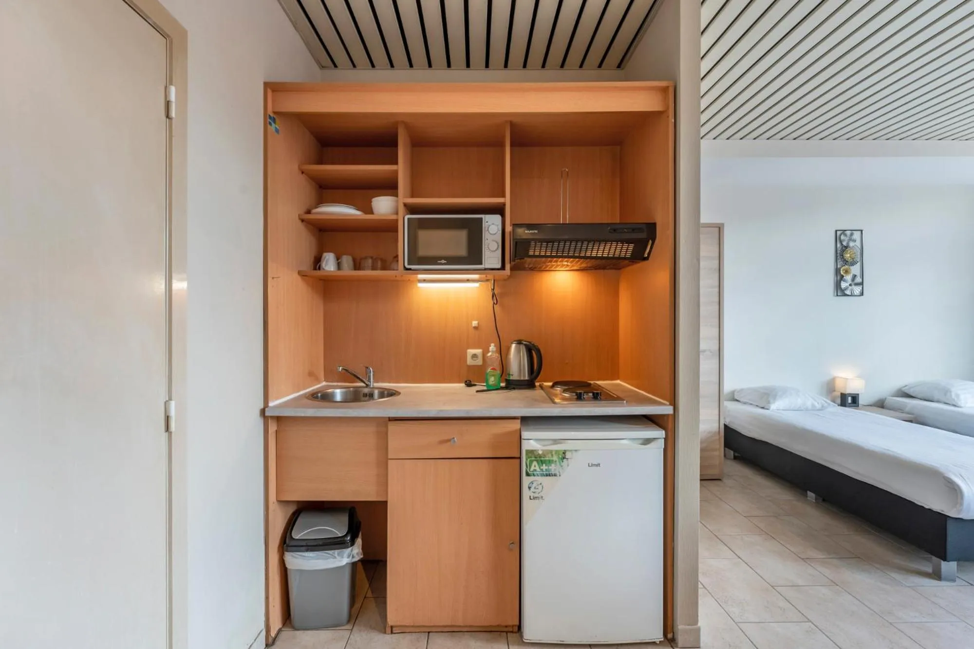 Bed in Condo Gardens Brussels