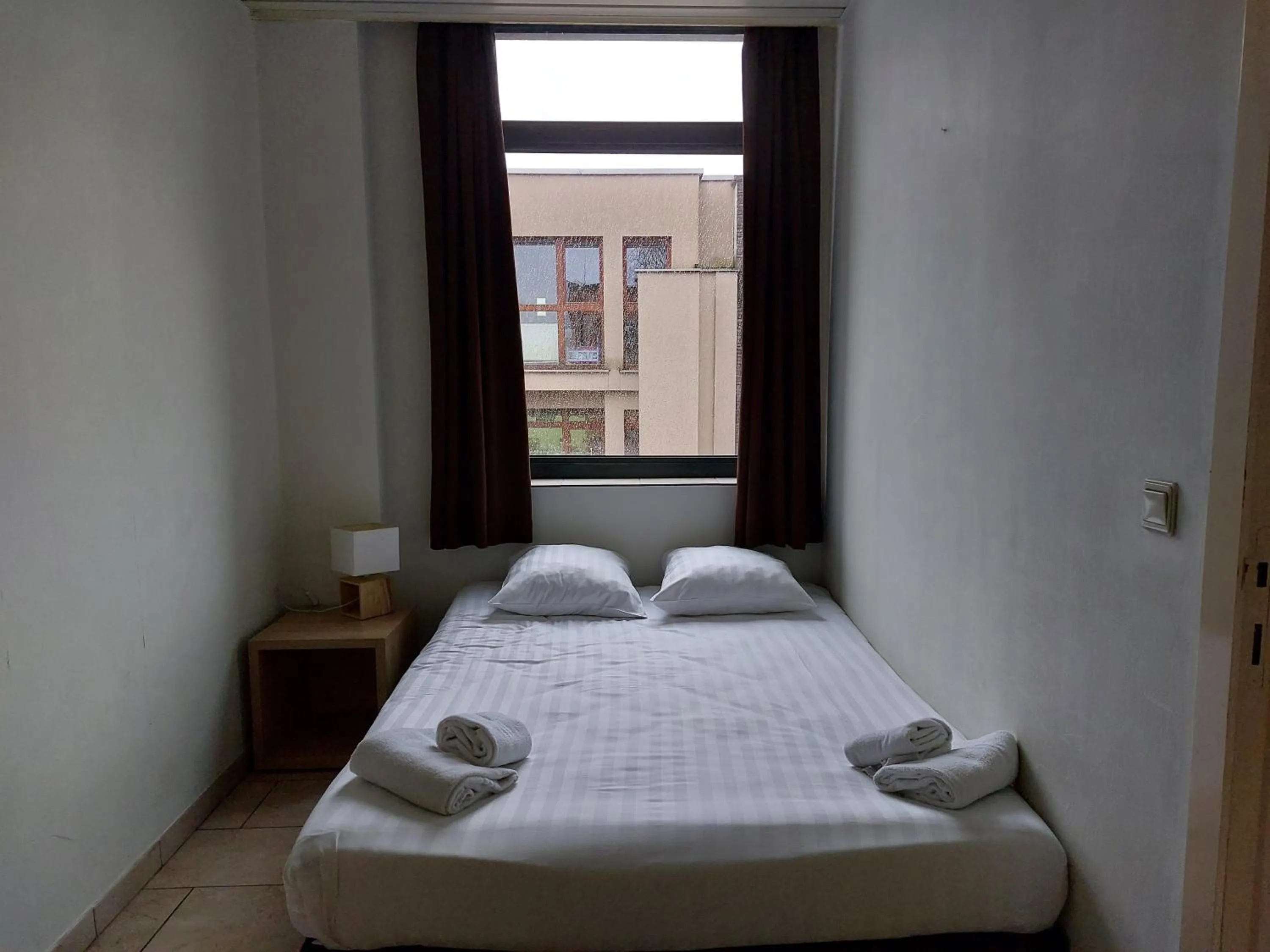 Bed in Condo Gardens Brussels