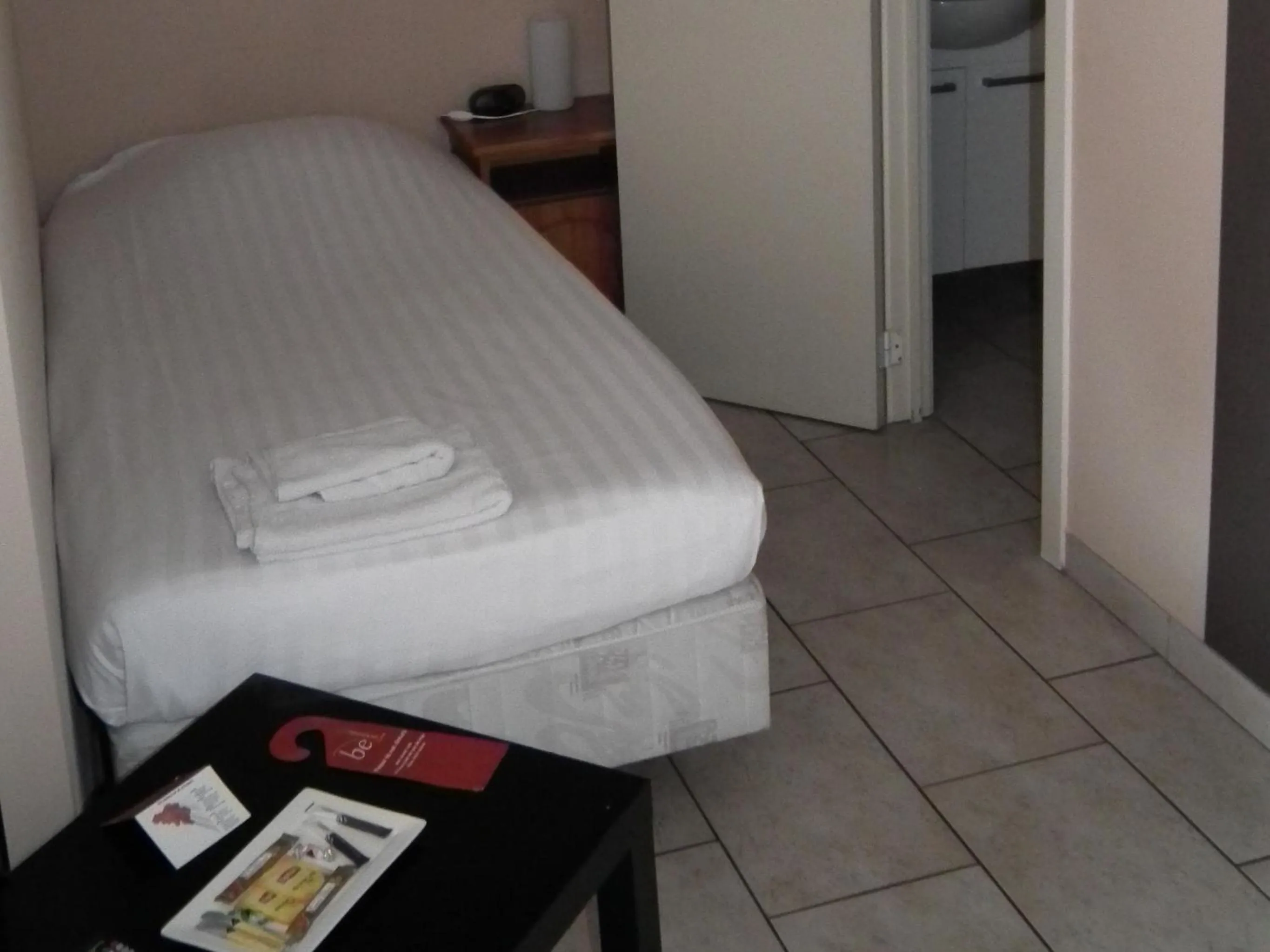 Bed in Condo Gardens Brussels