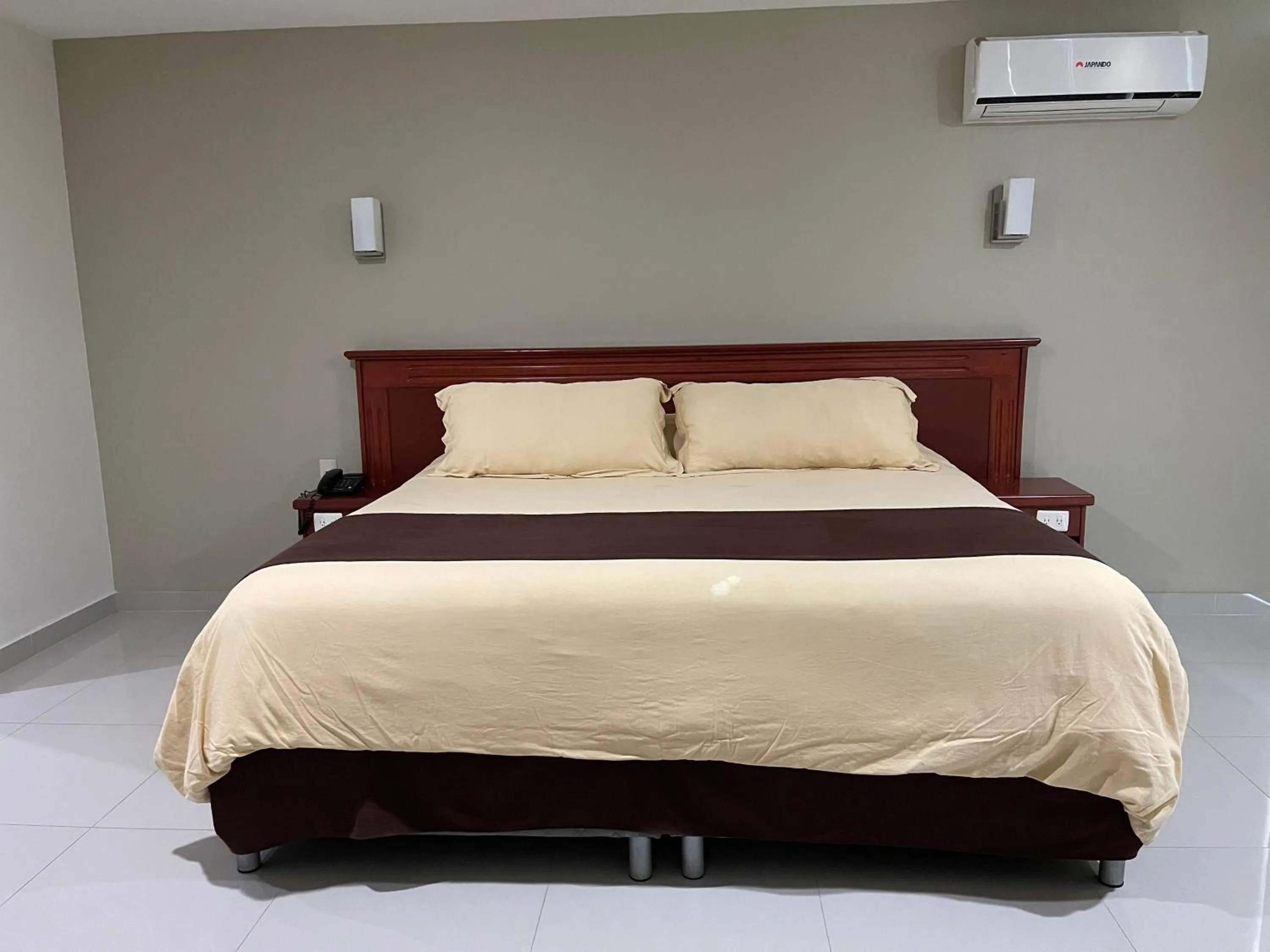 Bed in Hotel Latino