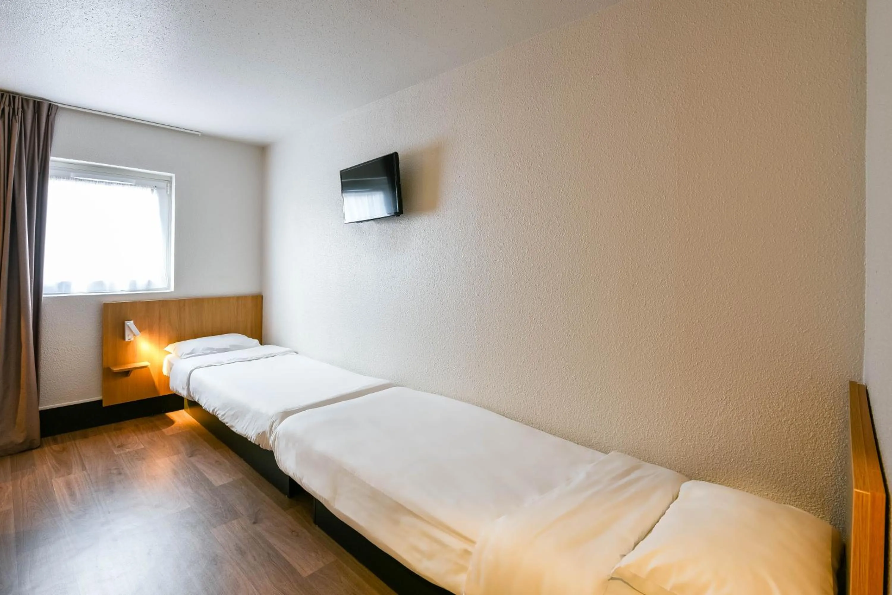 Bedroom, Bed in B&B HOTEL Narbonne 1