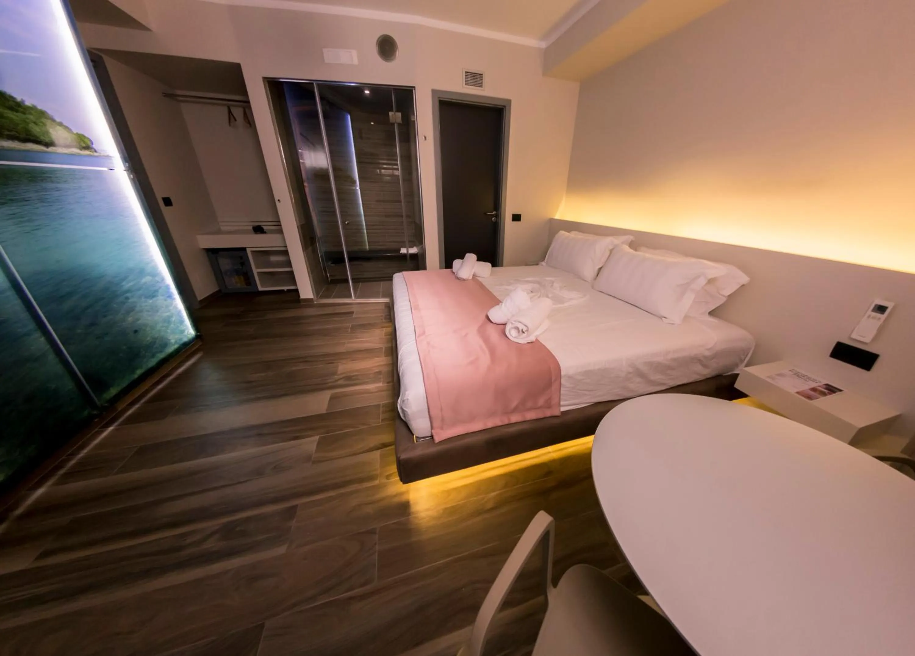 Bed in Hotel Pandora Residence