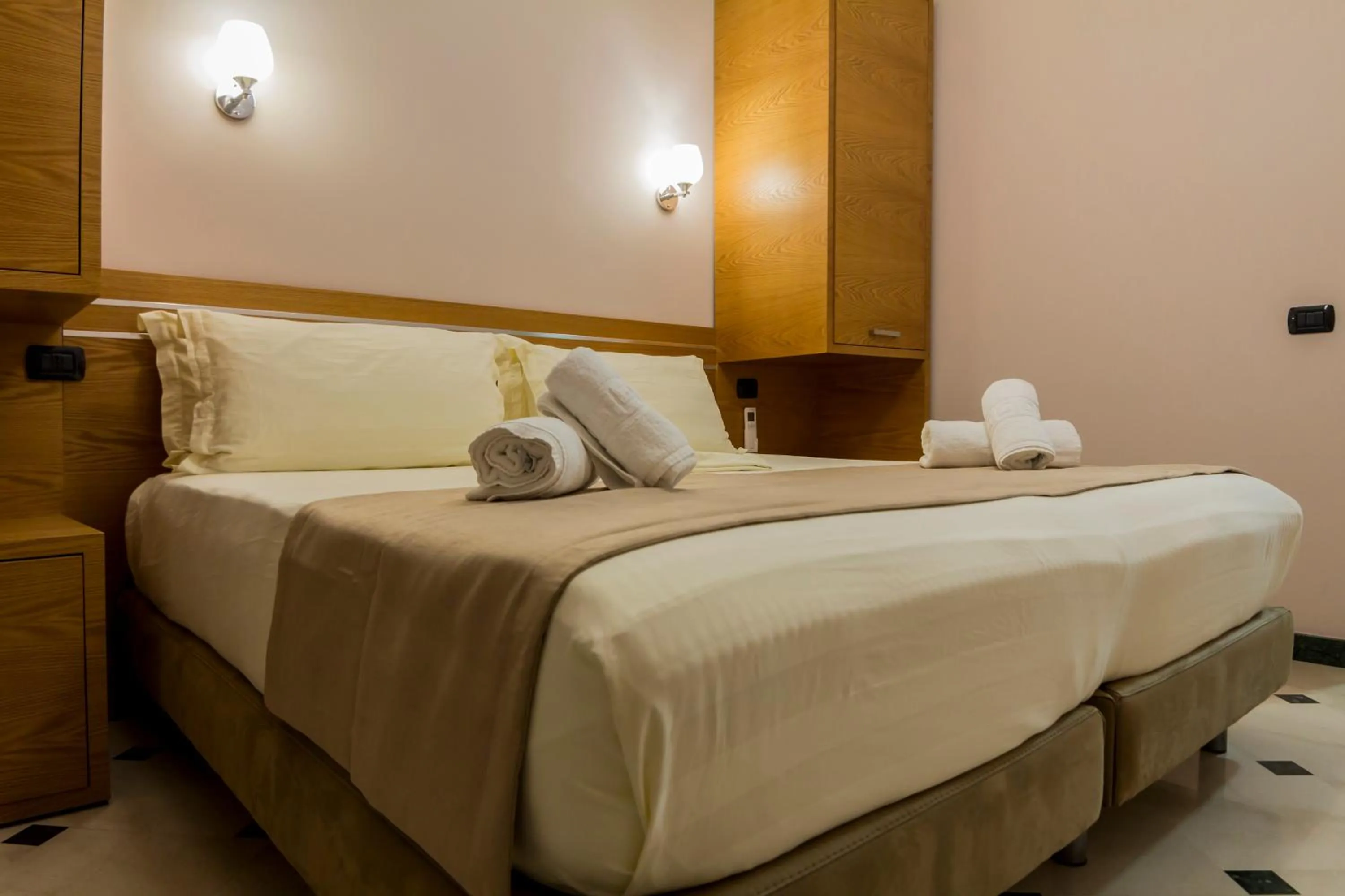 Bed in Hotel Pandora Residence