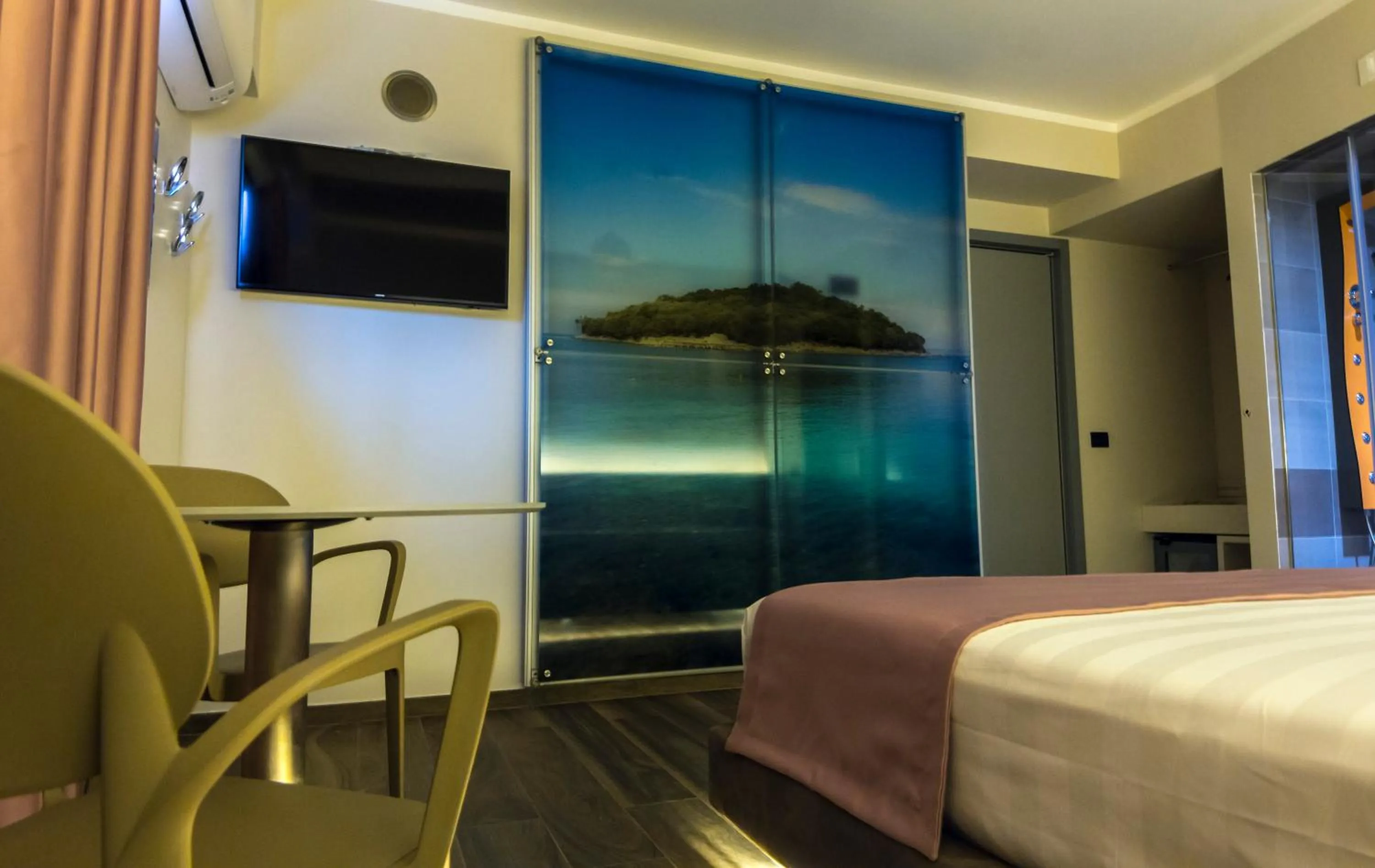 Bed in Hotel Pandora Residence