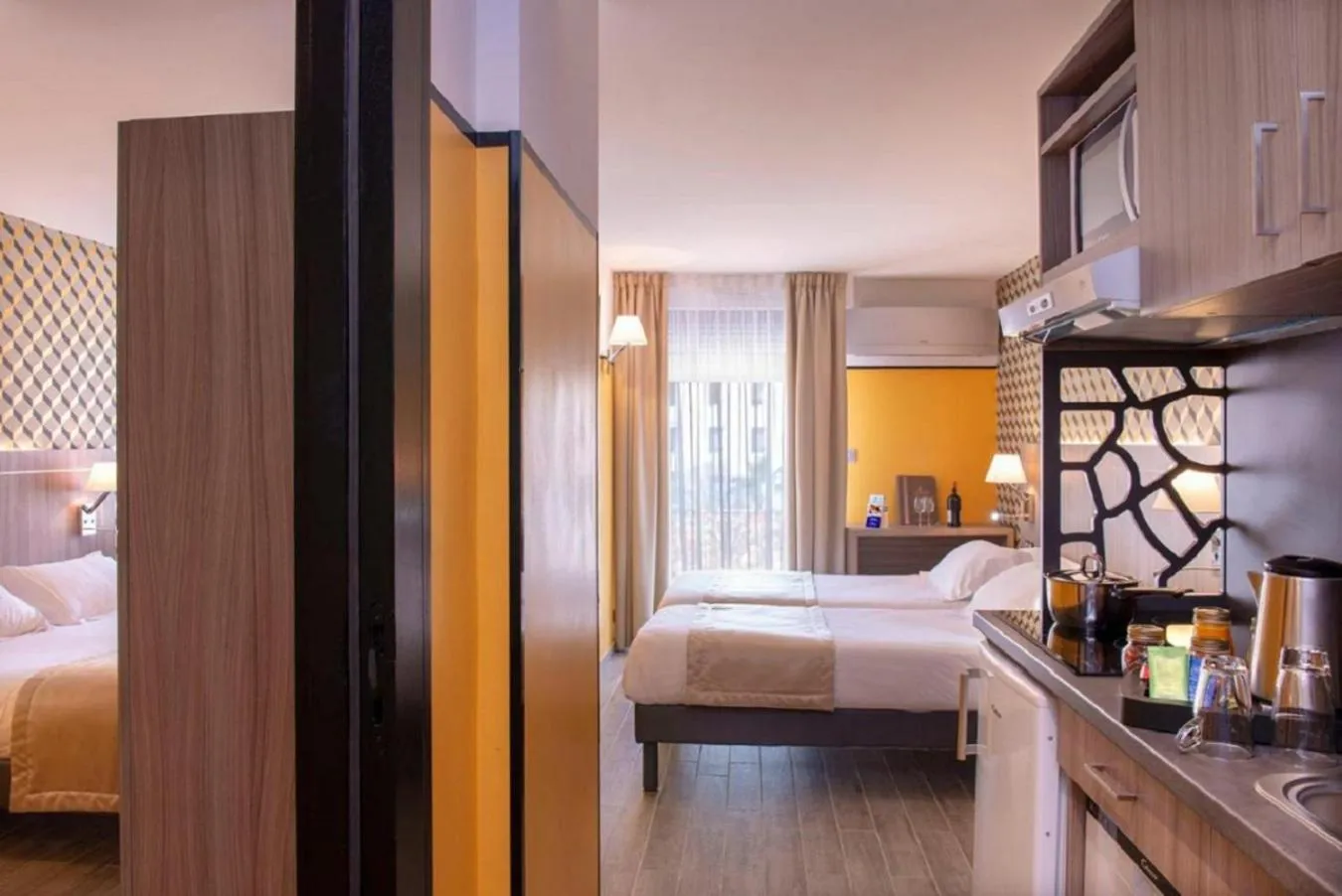 Bedroom, Bed in Unique Hôtel Résidence & Spa