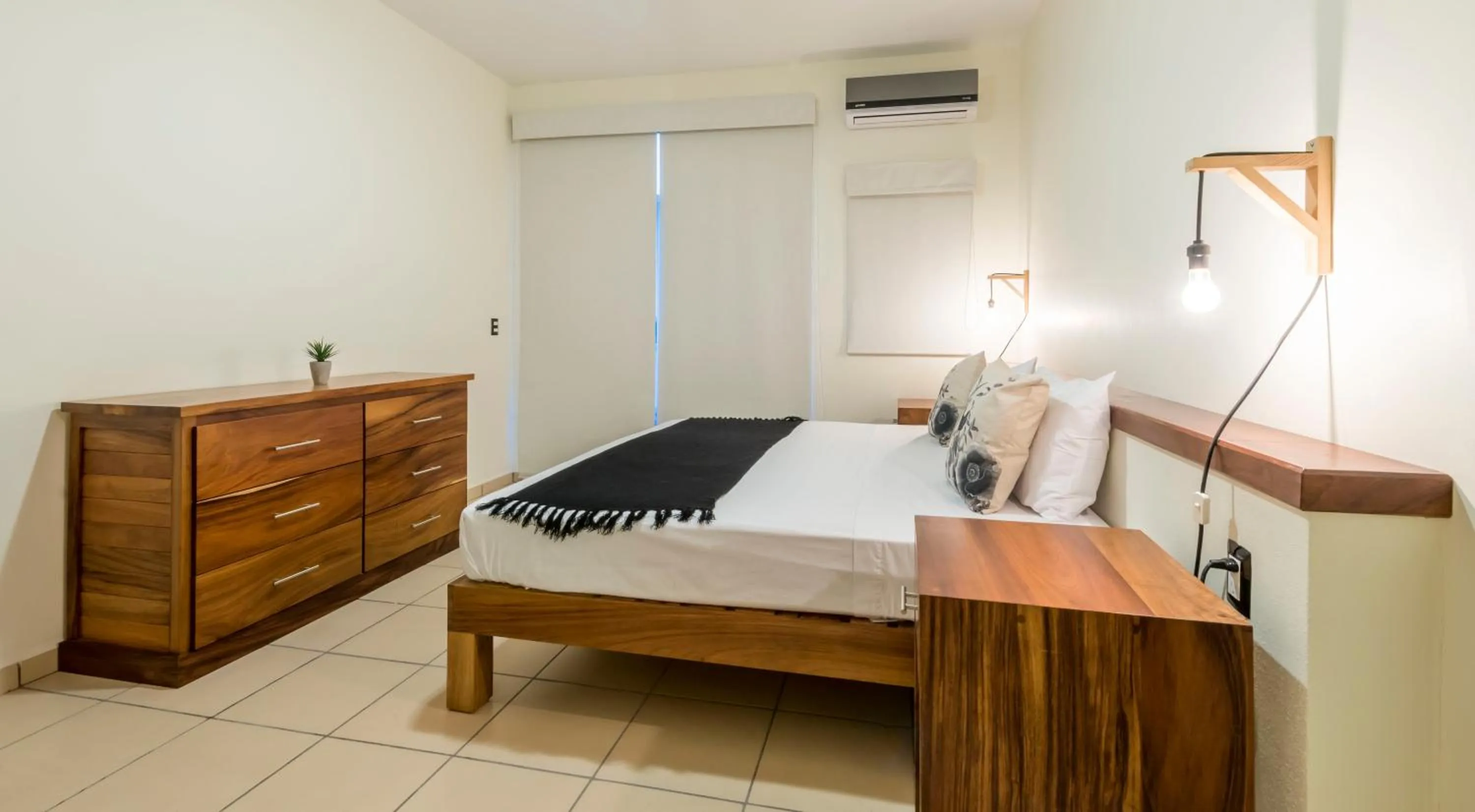 Living room, Bed in Punto Mita Eco Surf Suites & Café