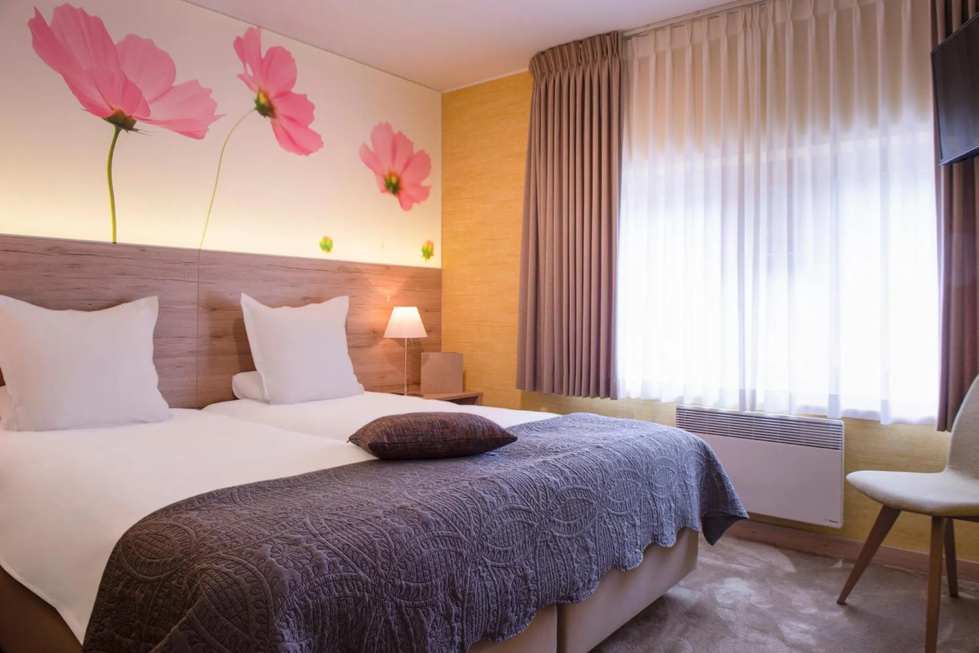 Bed in Hostellerie du Peiffeschof, The Originals Relais