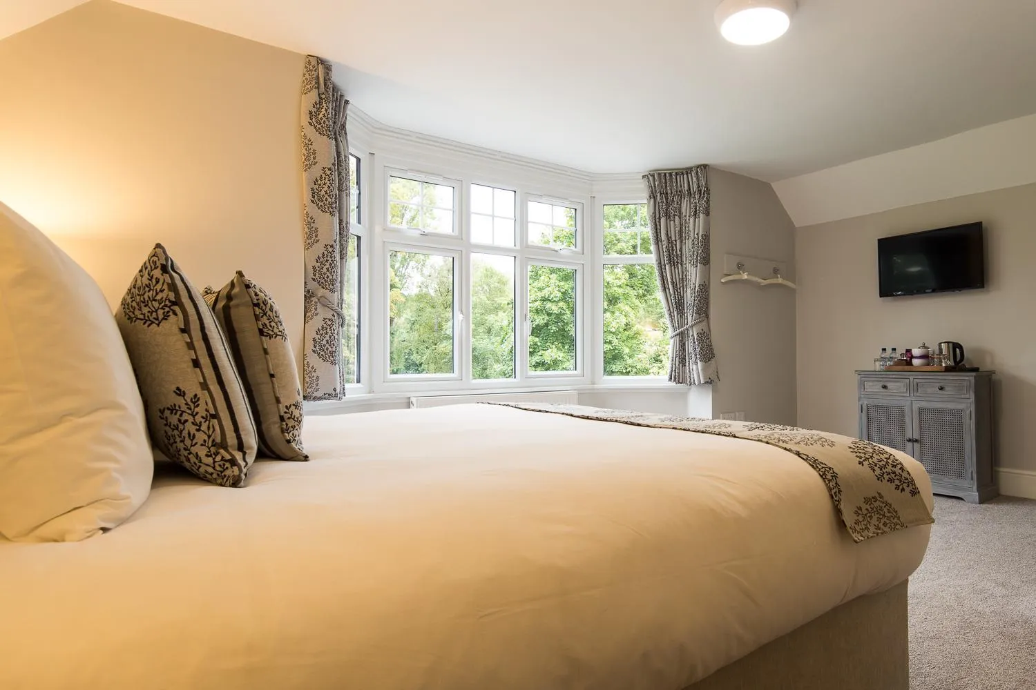 Bed in The Maple Manor Hotel