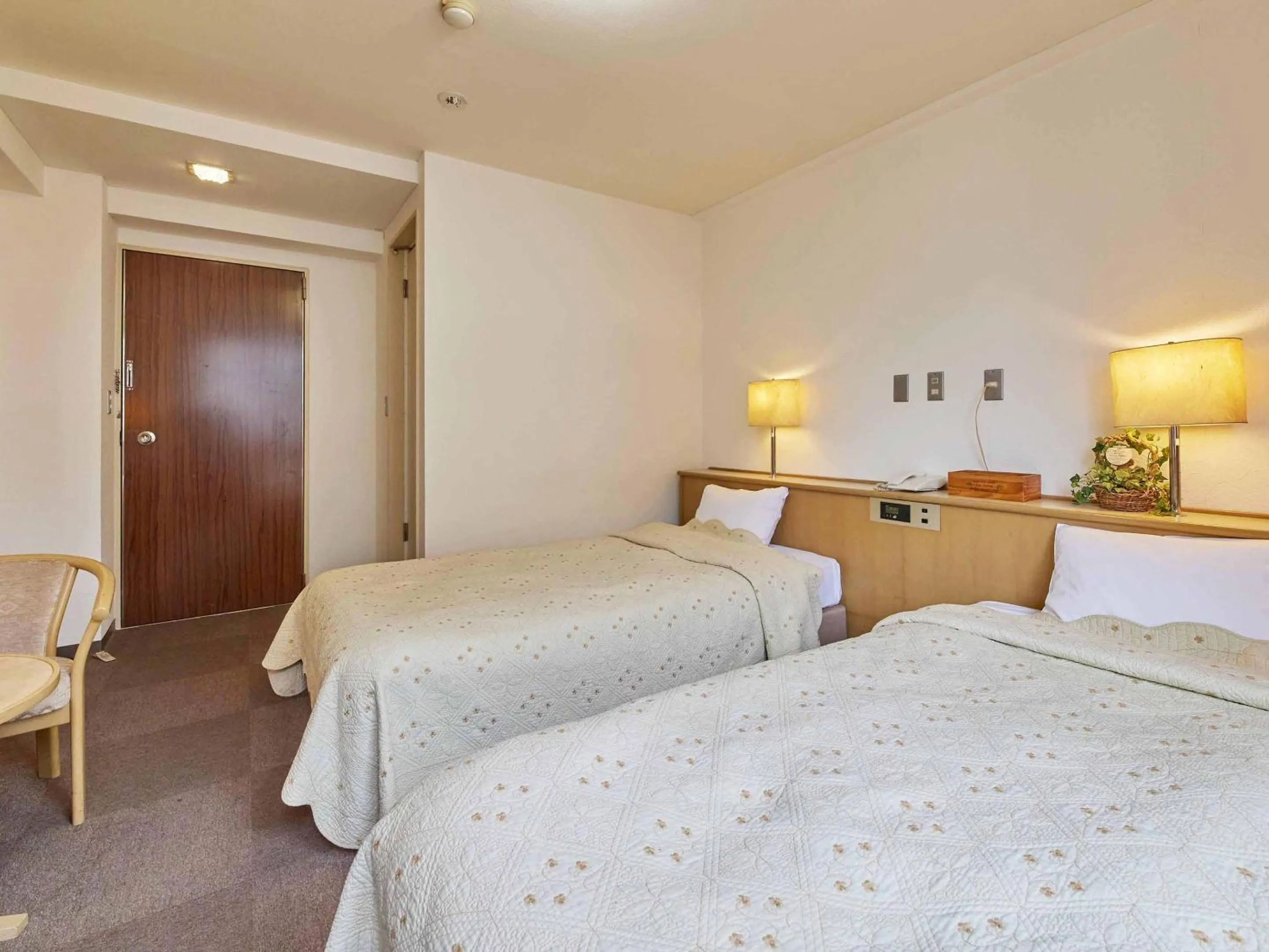 Bed in Kumagaya Royal Hotel Suzuki