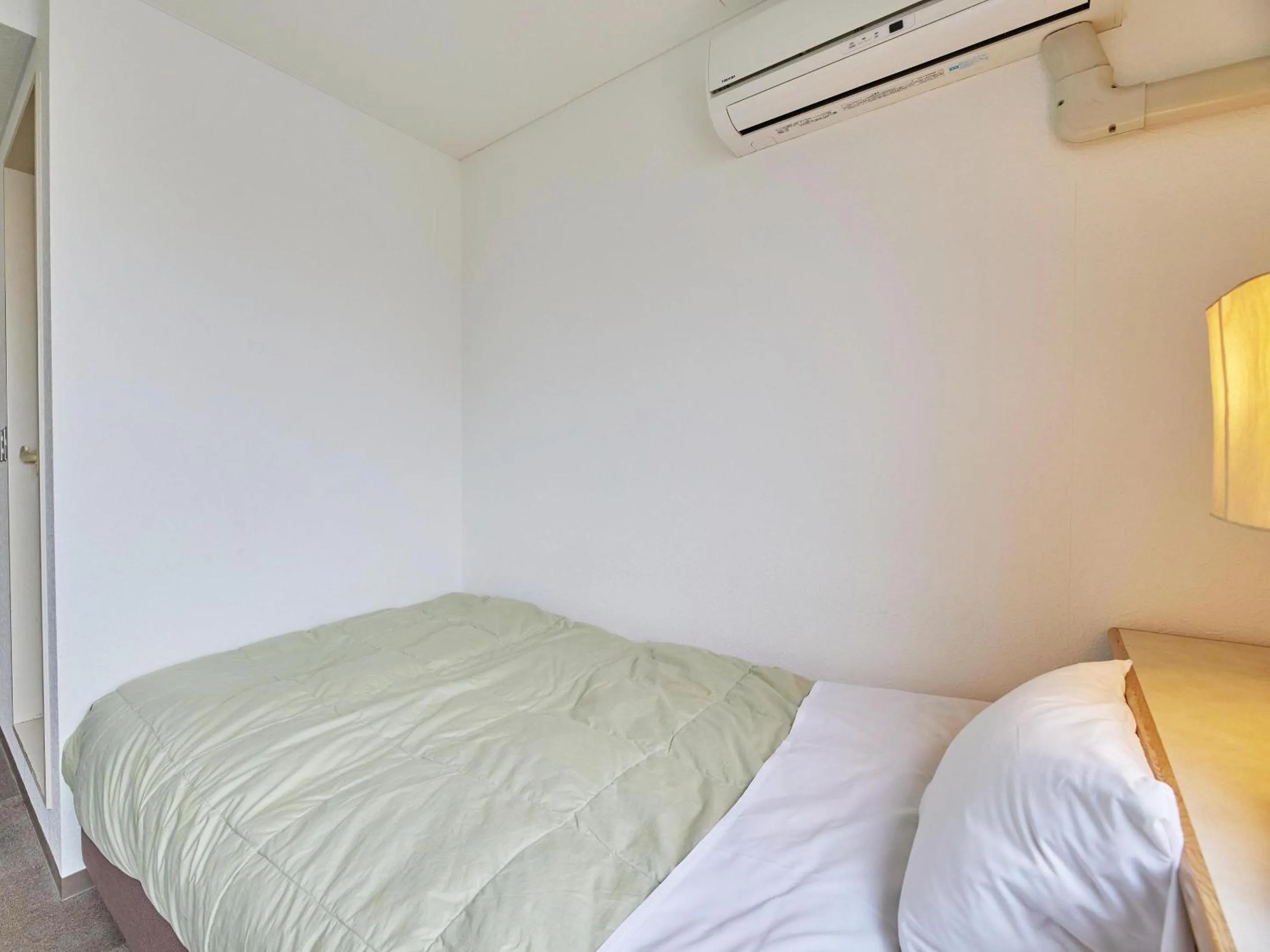 Bed in Kumagaya Royal Hotel Suzuki