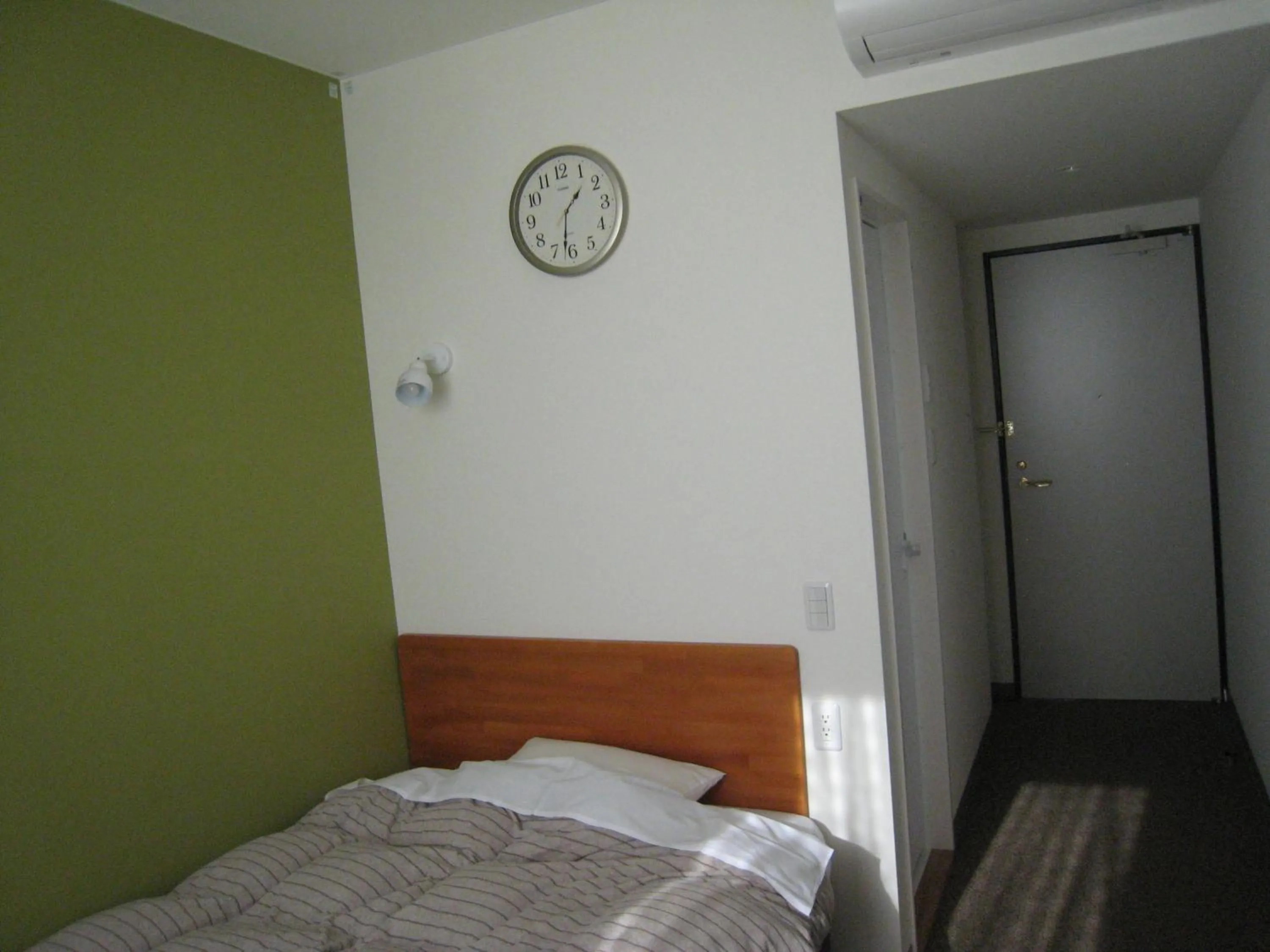 Bed in Kumagaya Royal Hotel Suzuki