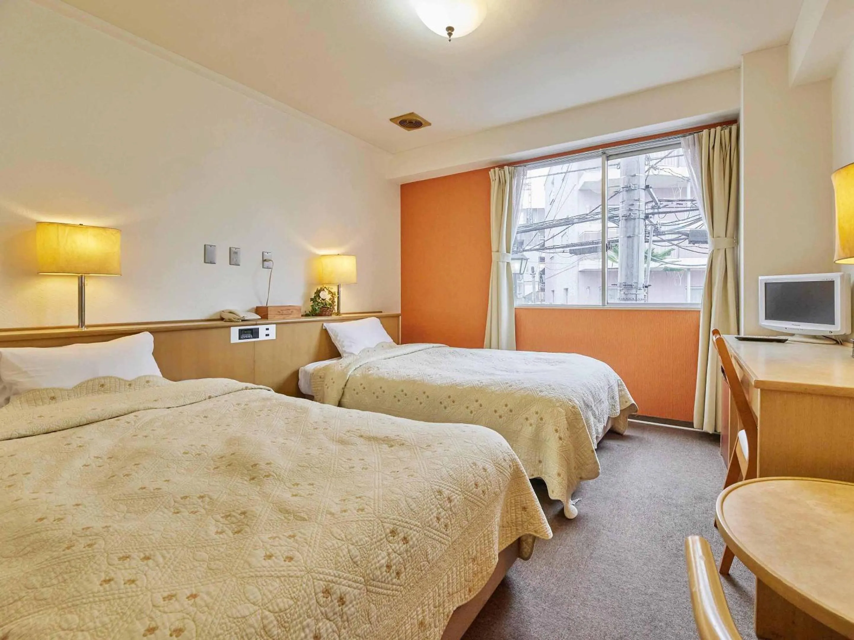 Bed in Kumagaya Royal Hotel Suzuki