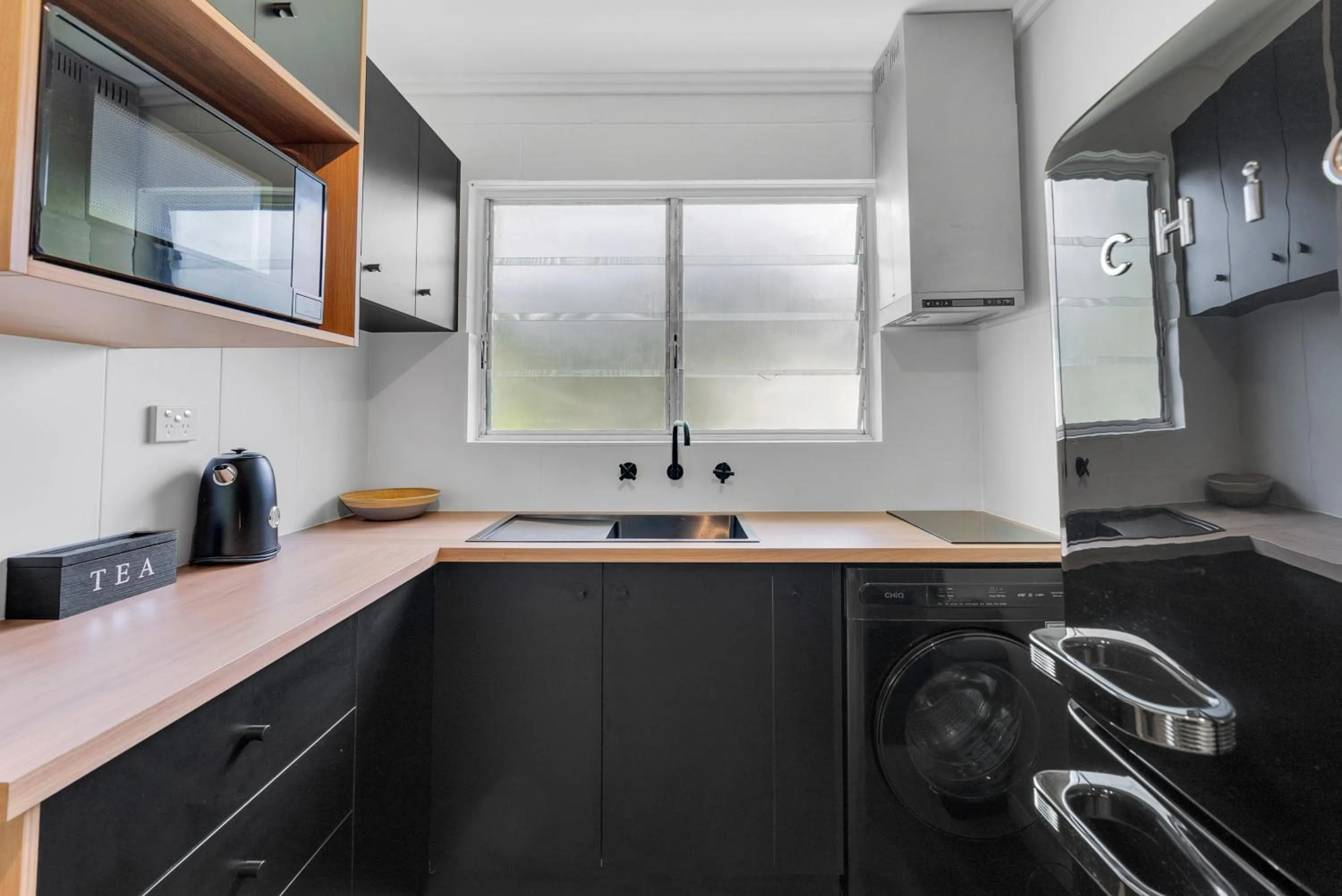 Kitchen or kitchenette in The Palms At Palm Cove